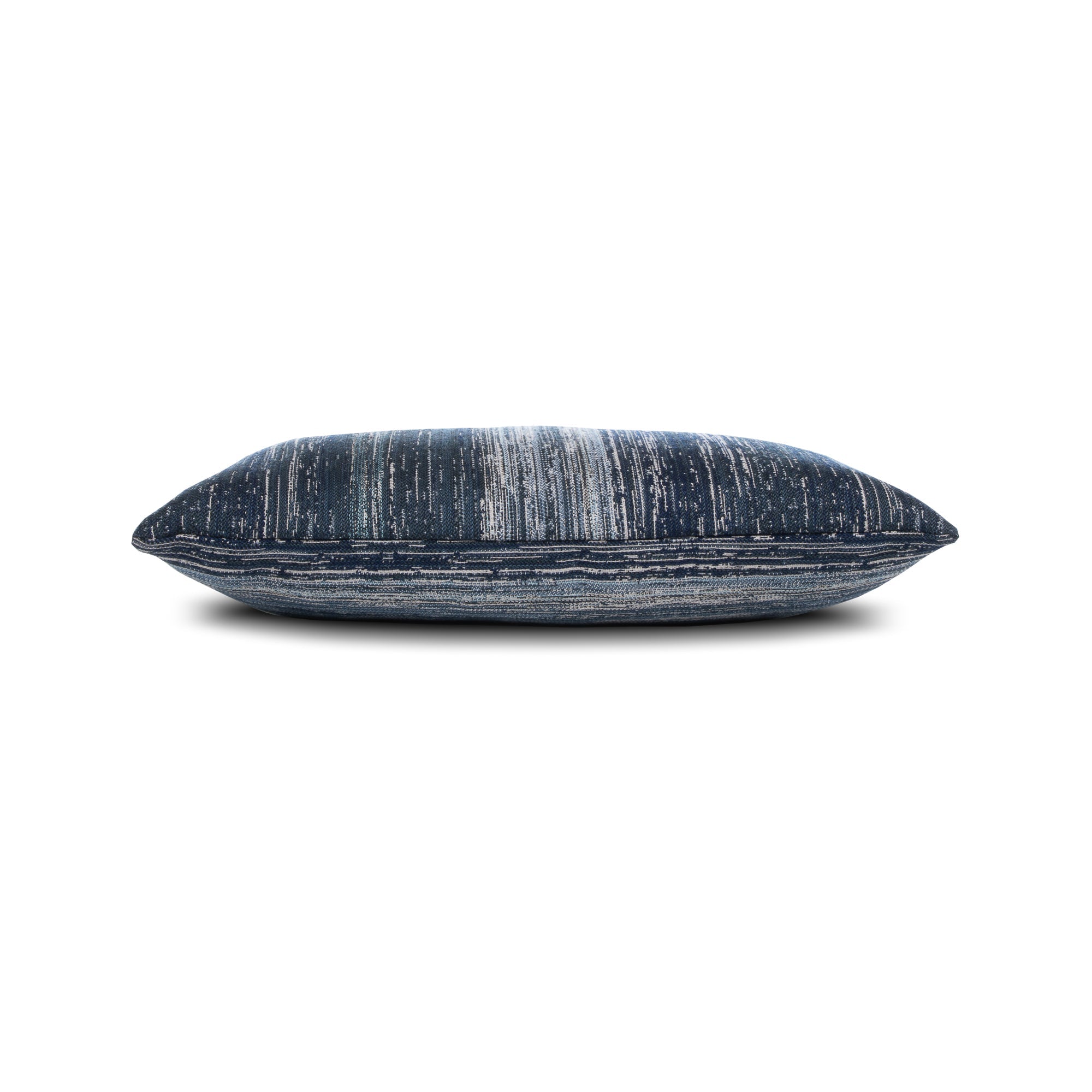 Side image of Blue striped ombre pillow in lumbar size for coastal indoor and outdoor decor