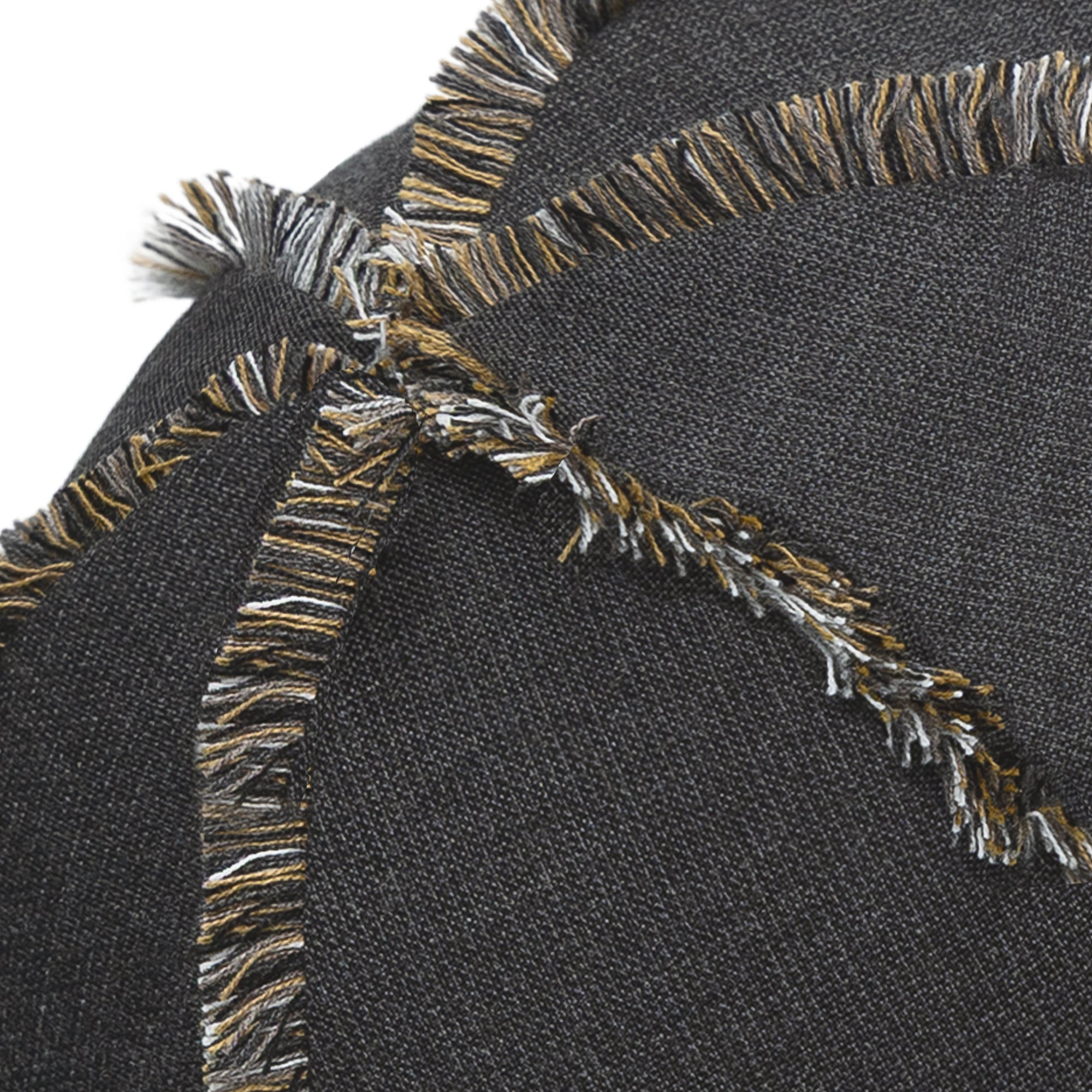 Detail image of Round carbon black outdoor pillow with textured finish for bold indoor and outdoor decor