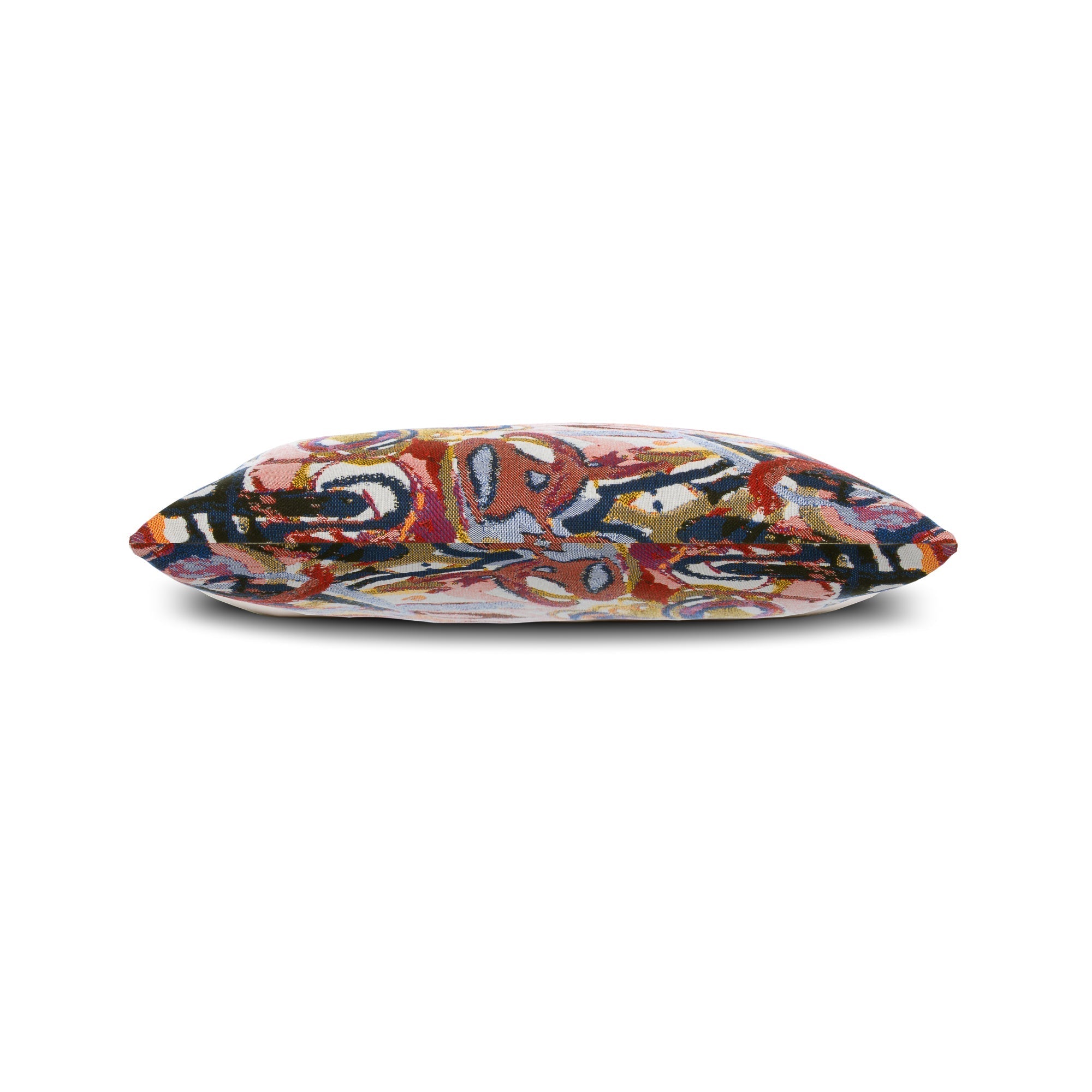 Side image of Red outdoor pillow with abstract pattern lumbar size for sophisticated patio decor