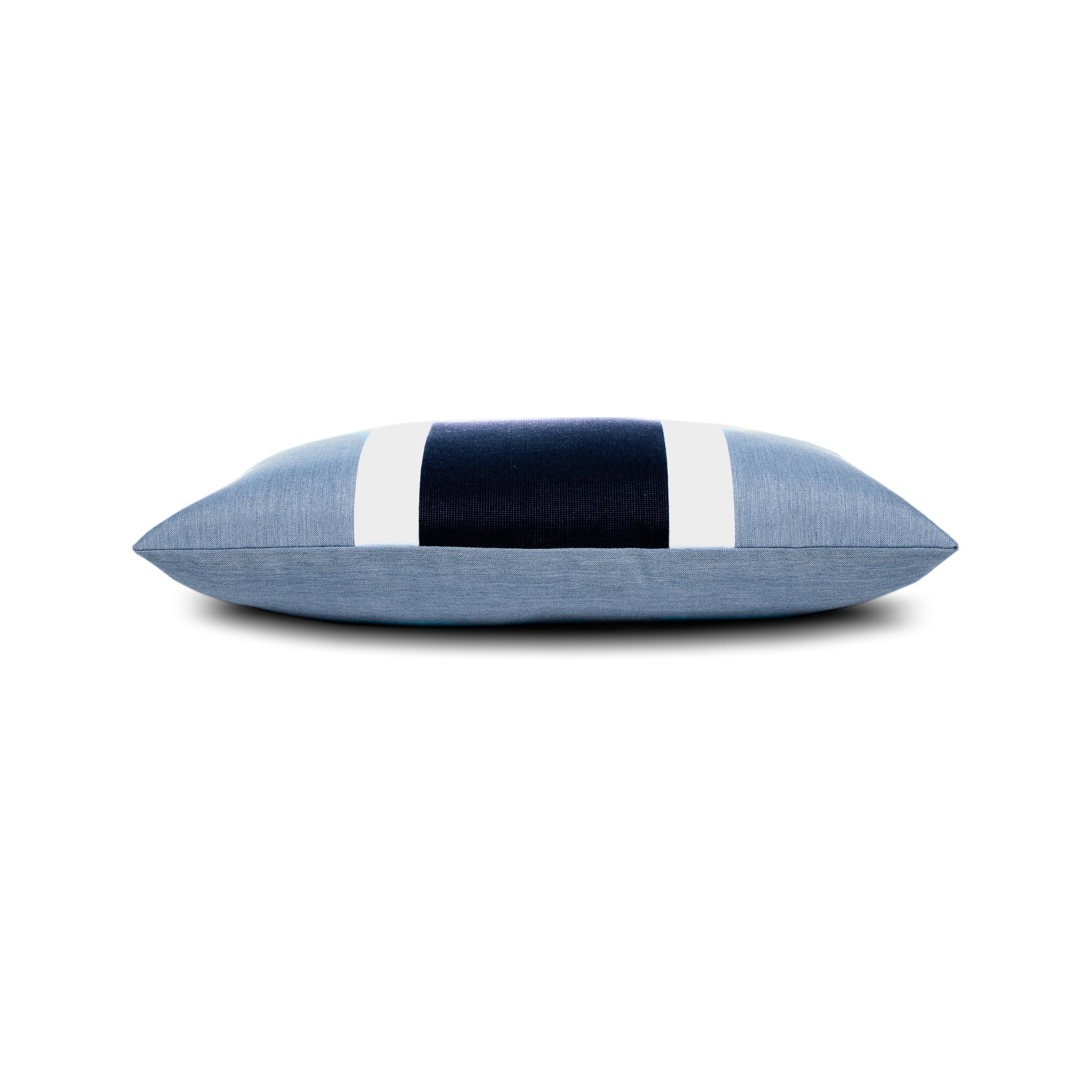 Side image of Blue outdoor pillow with white and navy center banding in lumbar size for modern indoor and outdoor decor