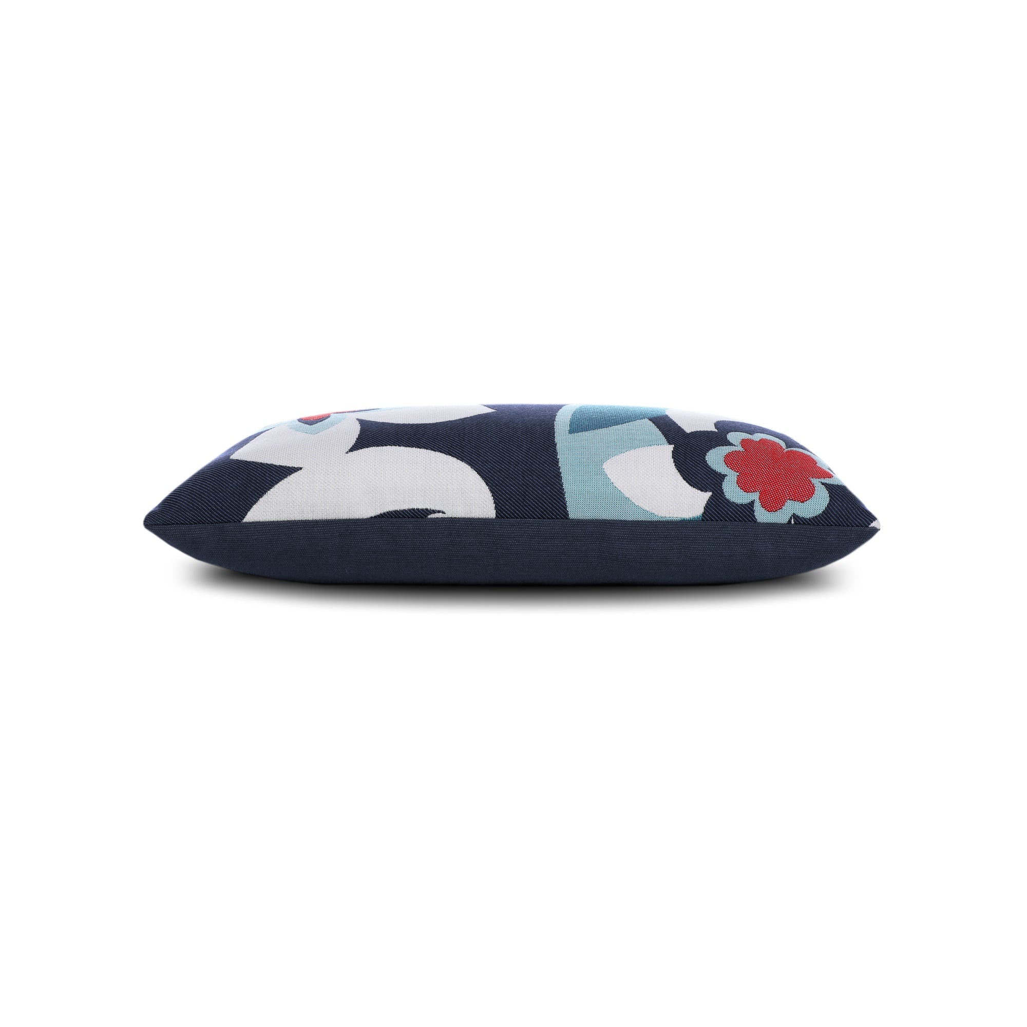 Side image of Navy outdoor pillow with abstract design lumbar size for contemporary patio decor