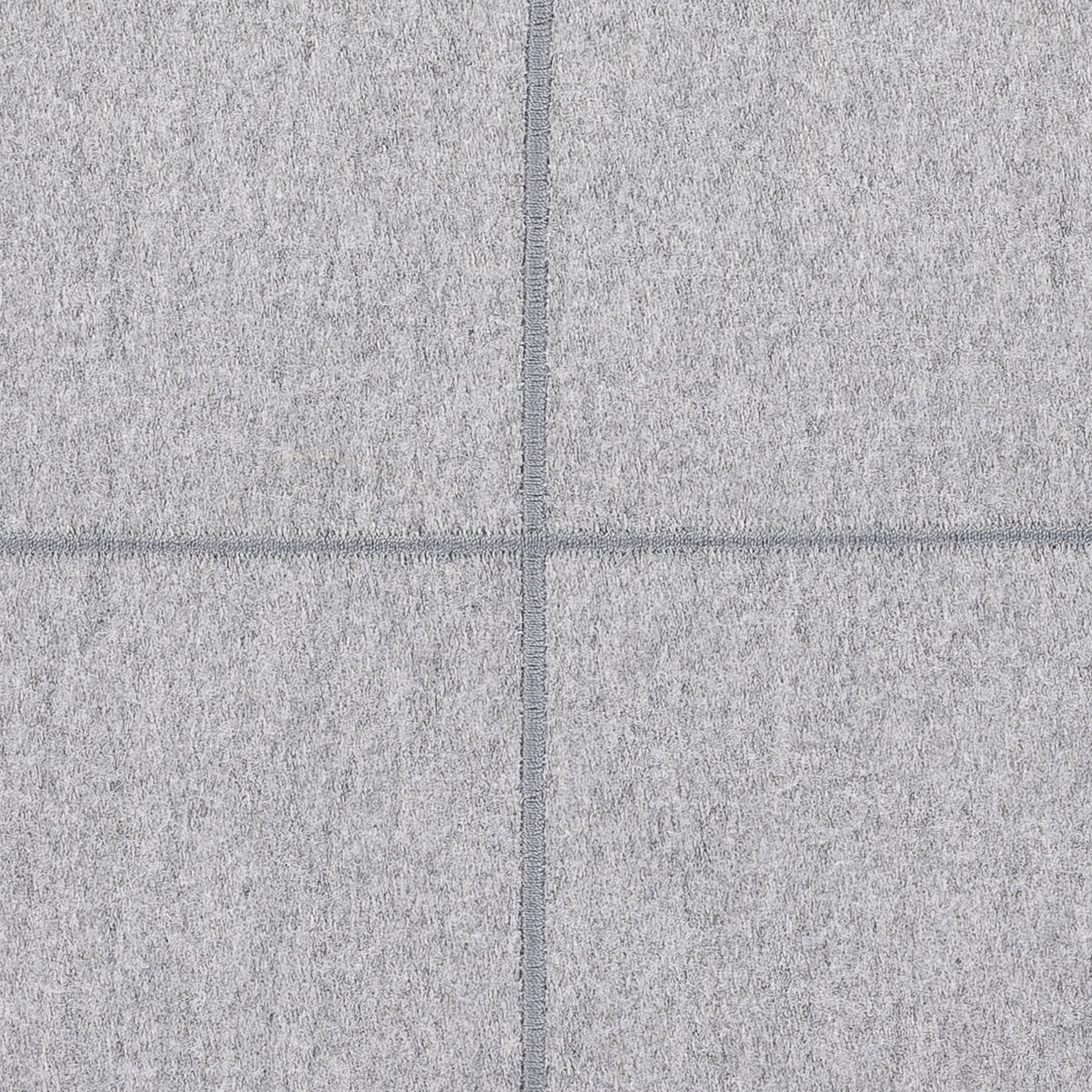 Detail image of Gray outdoor pillow with subtle texture for versatile outdoor styling