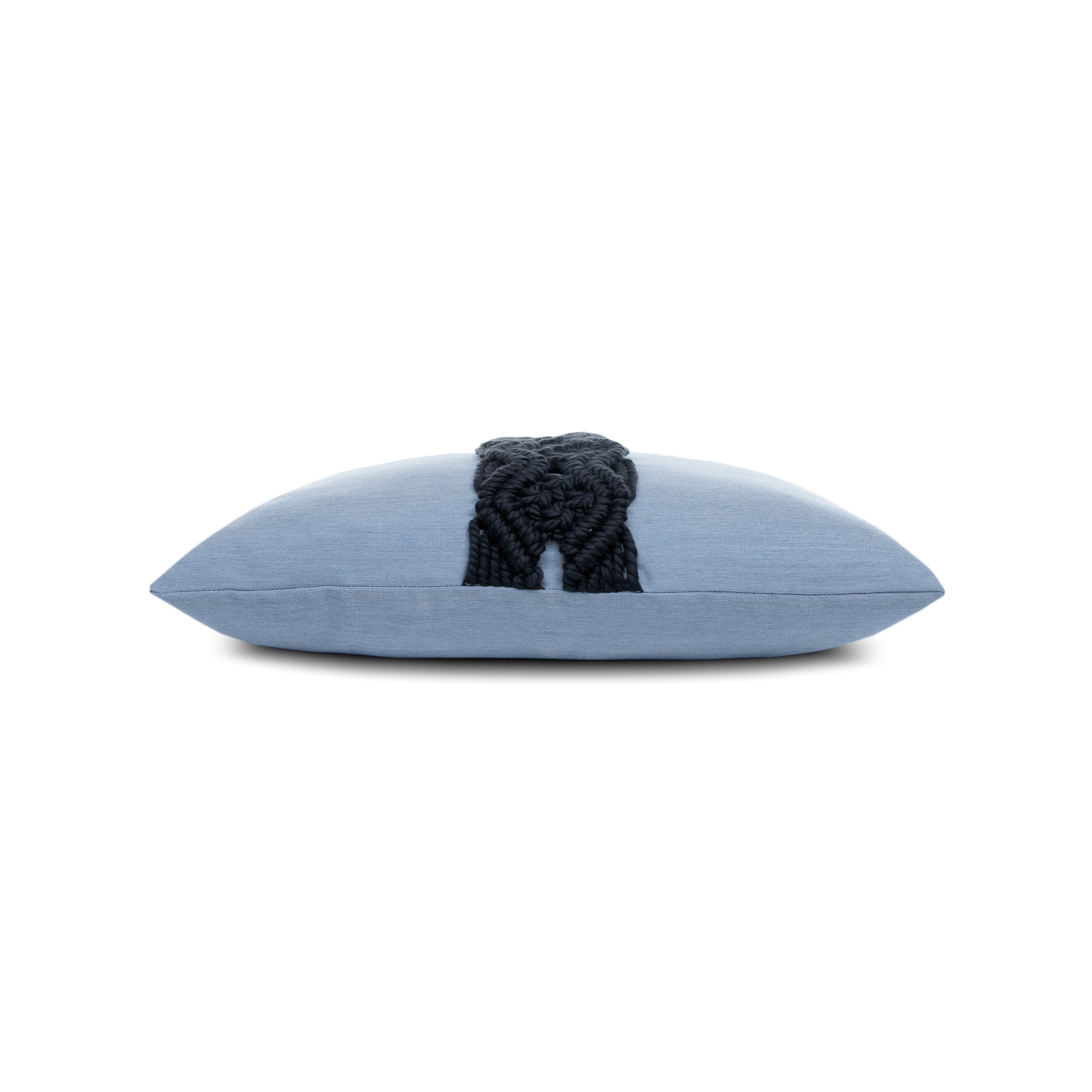 Side image of Blue pillow with dark blue macrame detailing as center band, square size for bold indoor and outdoor decor