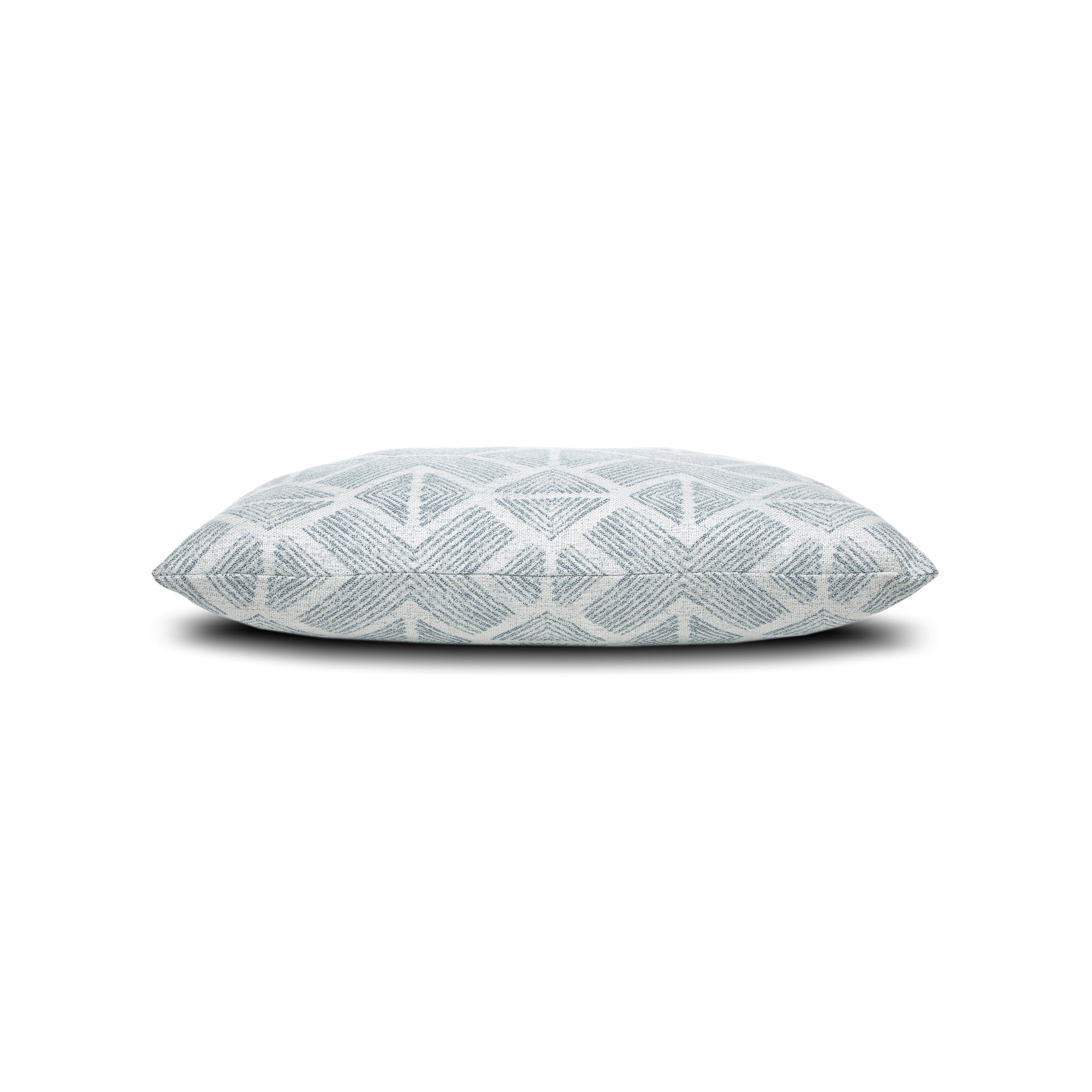 Side image of light blue gray damask outdoor pillow with intricate pattern for upscale outdoor seating