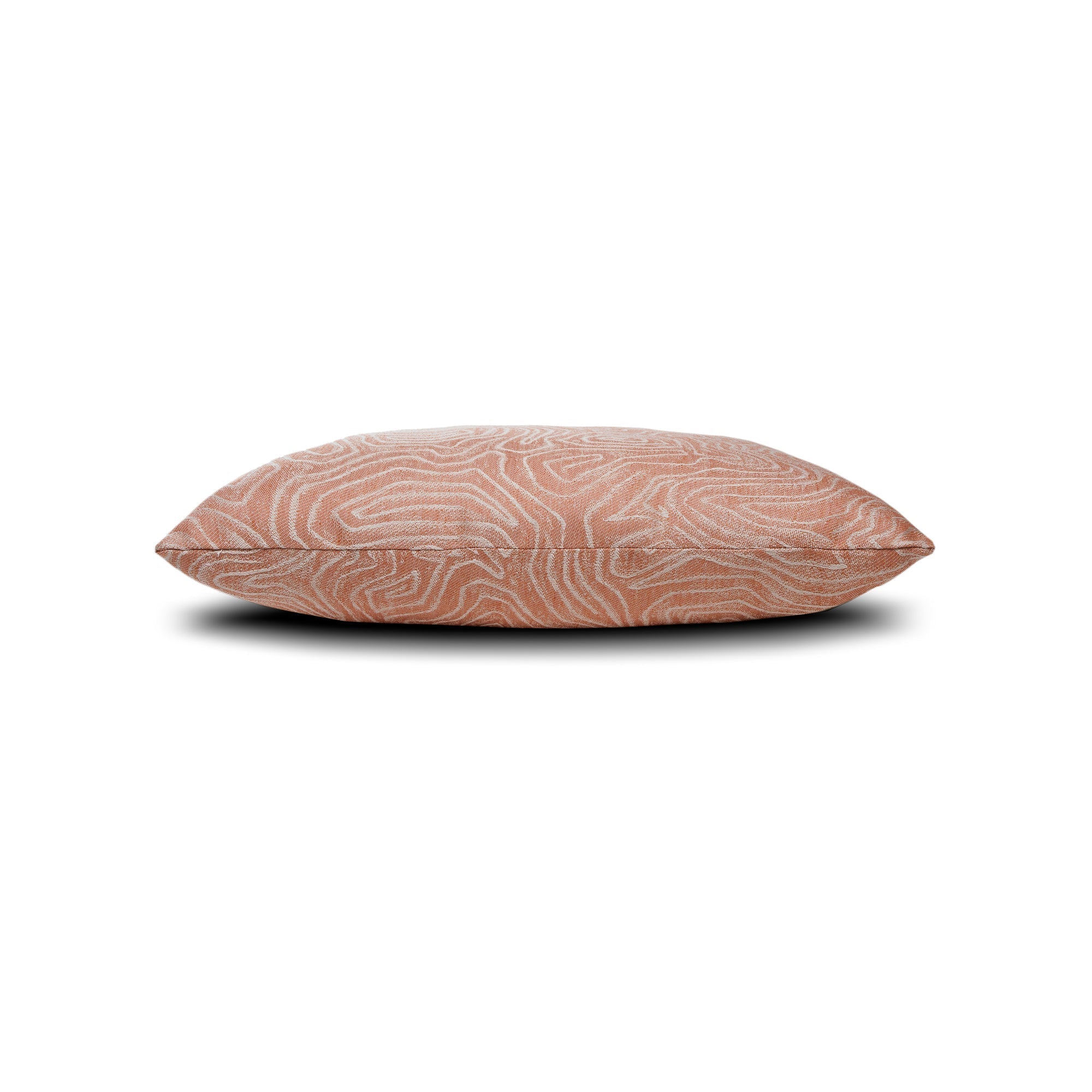 Side image of Coral outdoor pillow with solid texture, lumbar size for vibrant patio decor