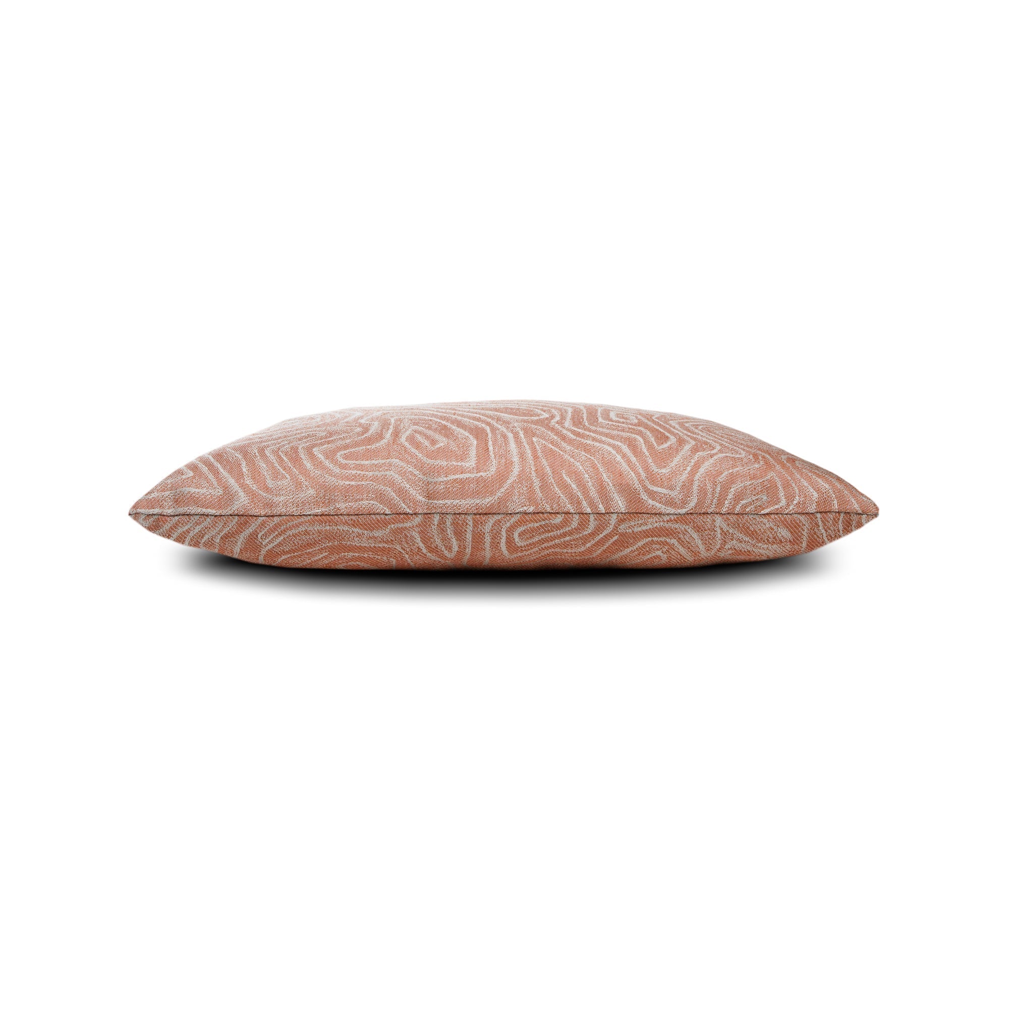Side image of Coral outdoor pillow with solid texture, square size for warm outdoor accents
