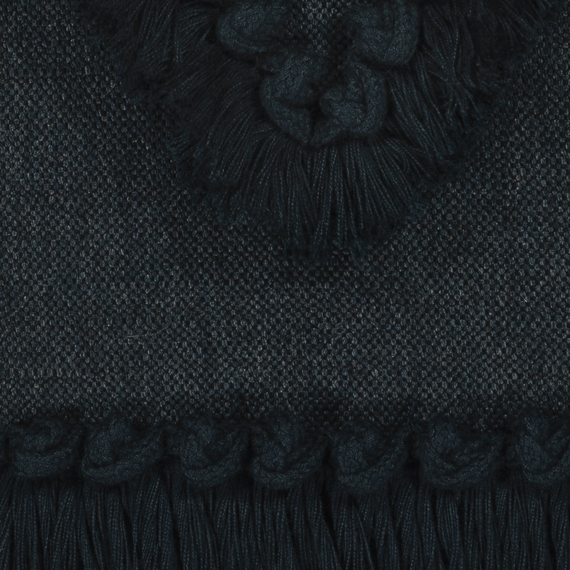 Detail image of Indigo solid pillow with fringe accents in lumbar size for dramatic indoor and outdoor decor