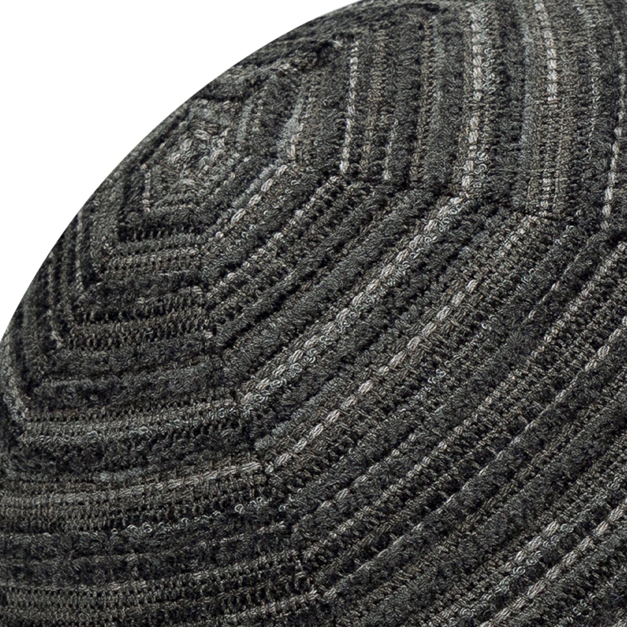 Detail image of Round black outdoor pillow with textured finish for bold indoor and outdoor decor