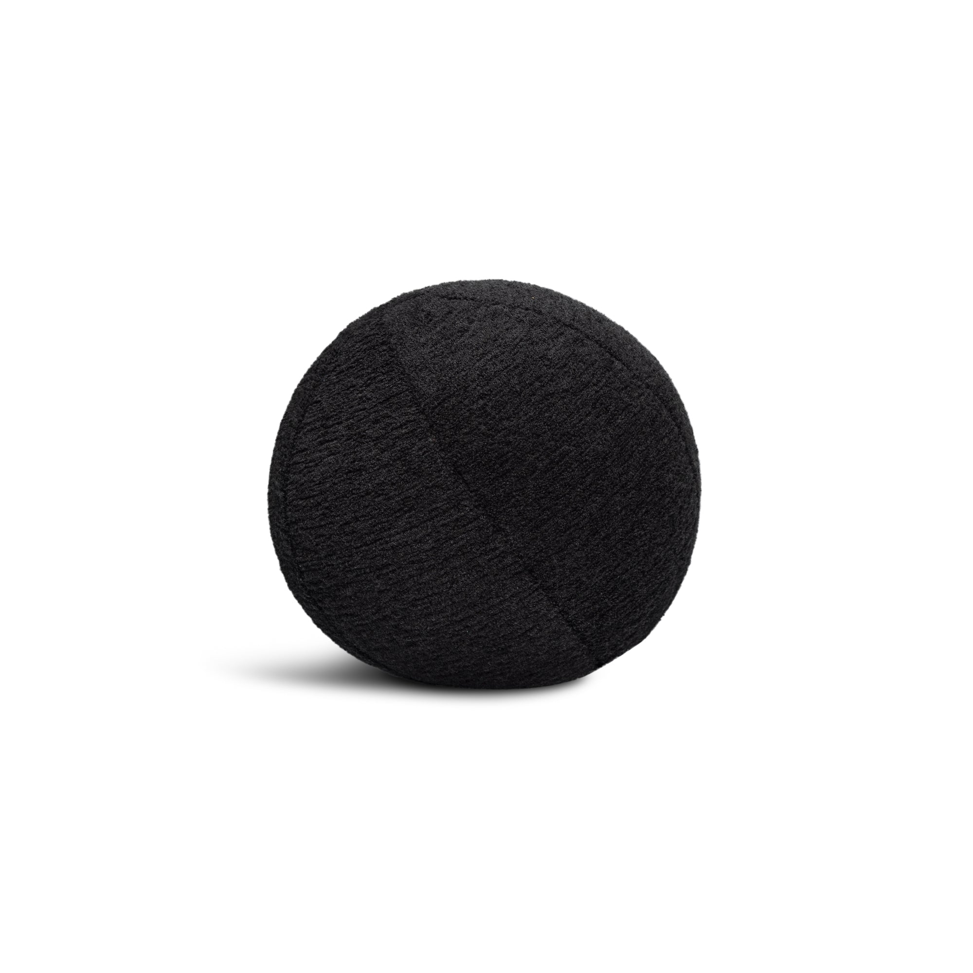 Round plush black pillow with textured finish for chic indoor and outdoor decor