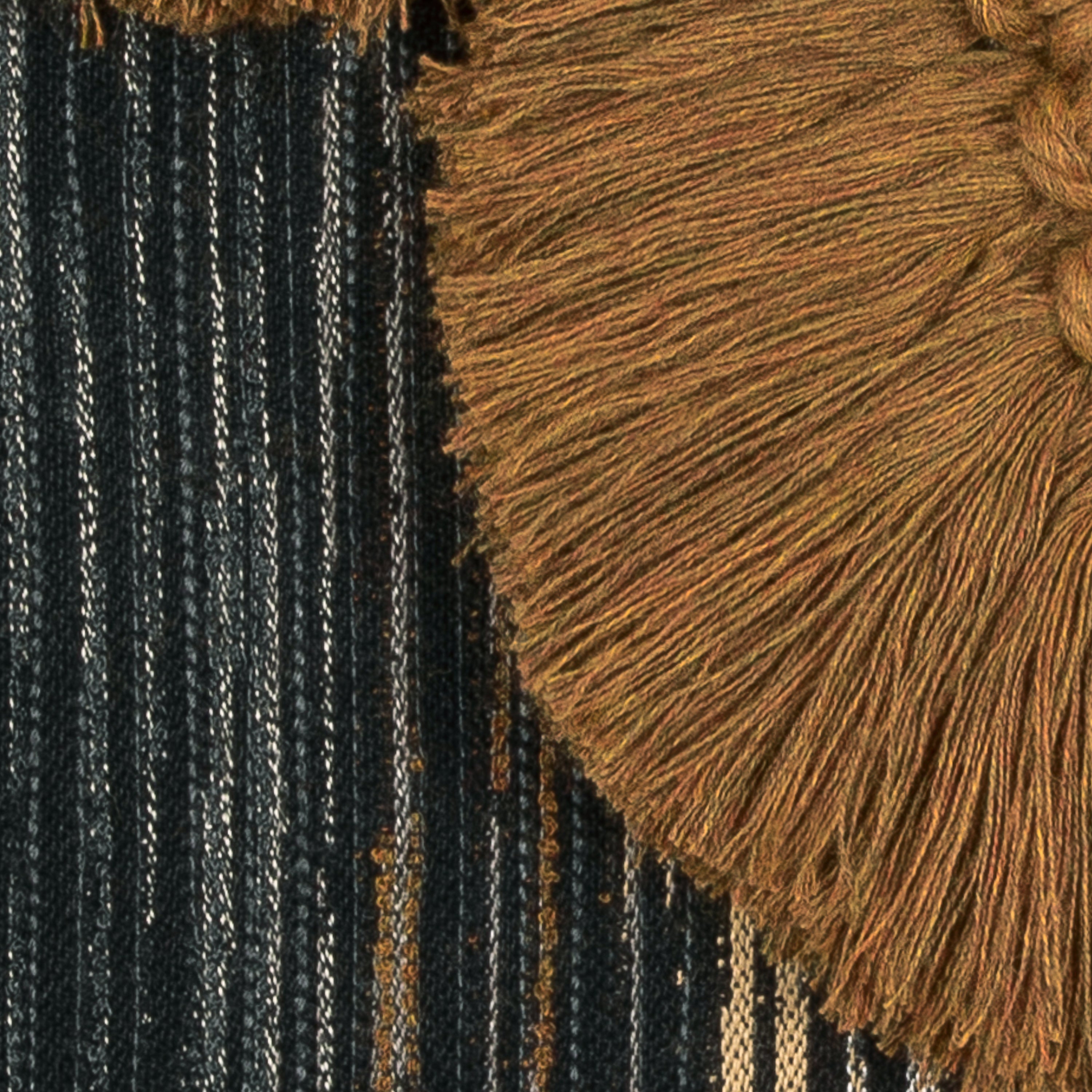 Detail image of Black striped outdoor pillow with abstract macrame leaf design in rust square size for modern patio decor