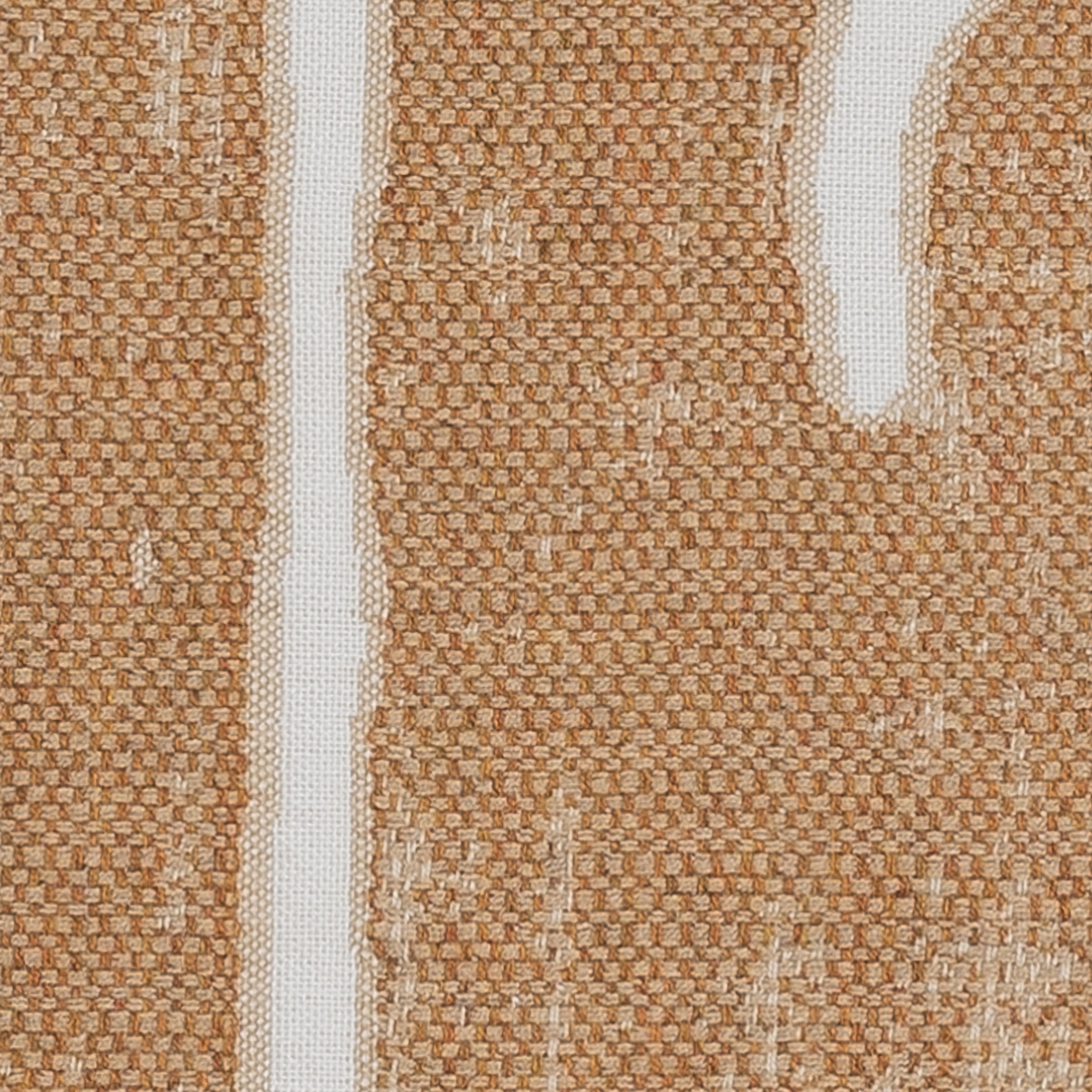 Detail image of Caramel outdoor pillow with abstract design lumbar size for contemporary patio decor by Elaine Smith