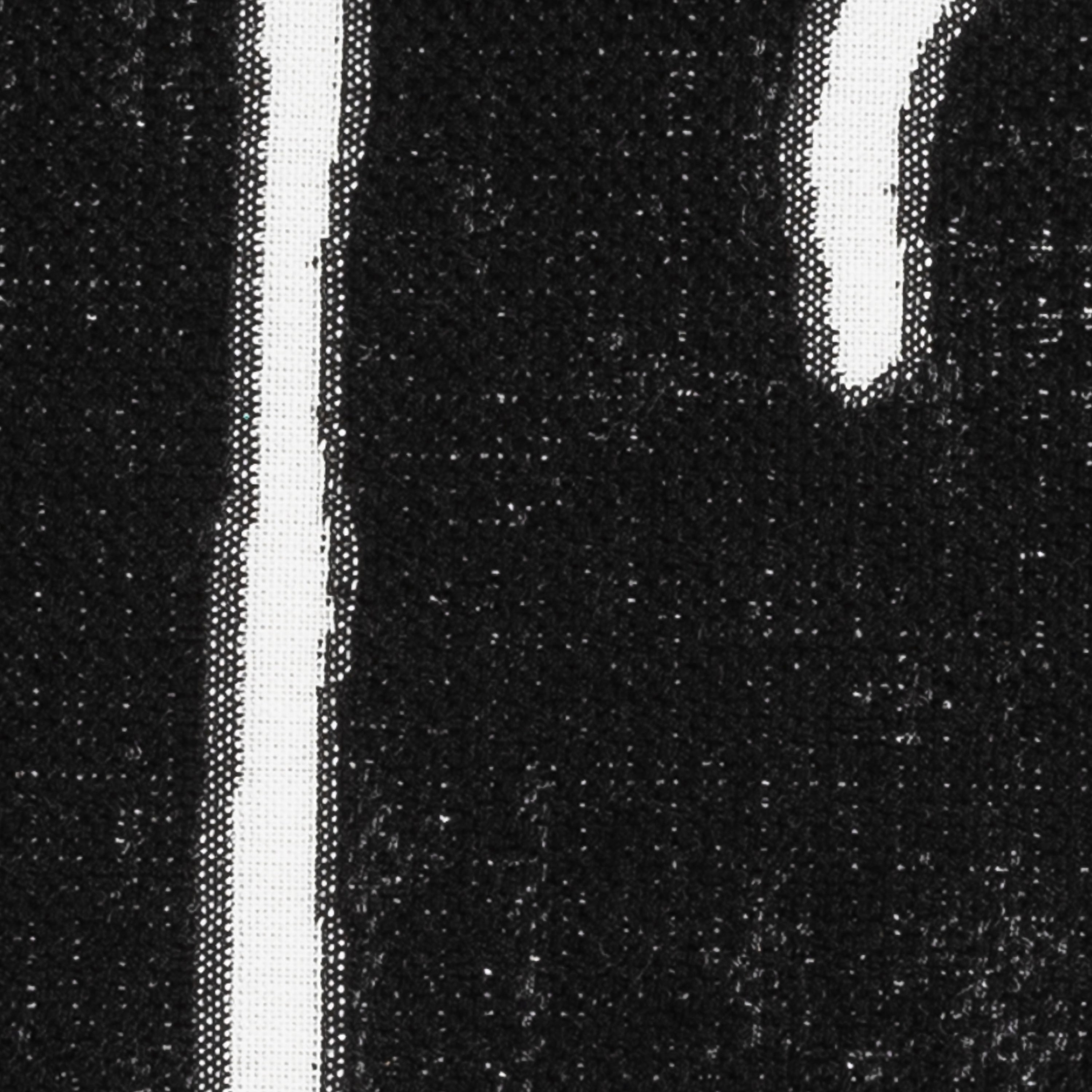 Detail image of Black abstract outdoor pillow with rectangular shape lumbar size for dramatic patio decor by Elaine Smith