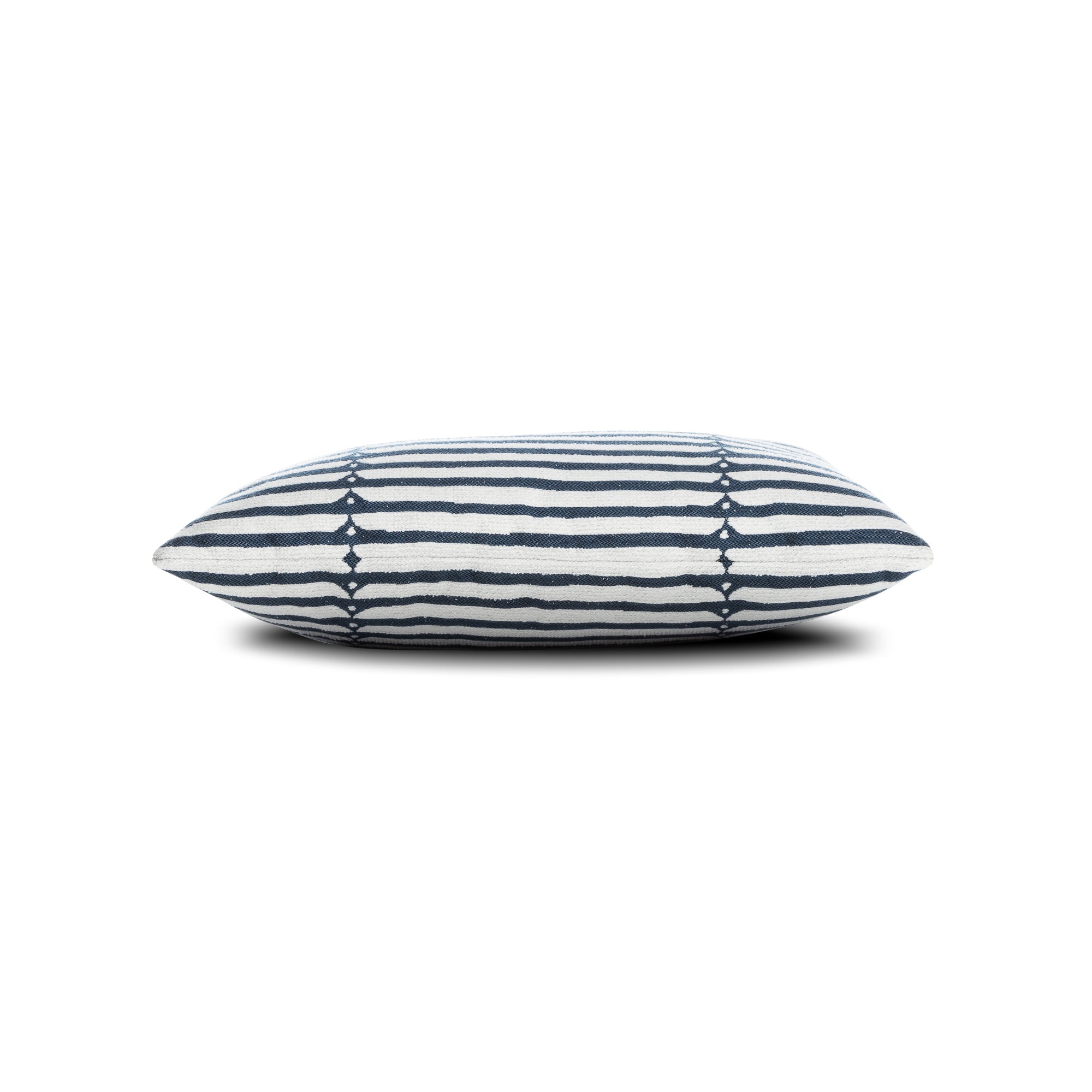 Side image of Denim blue striped pillow lumbar size for coastal indoor and outdoor decor