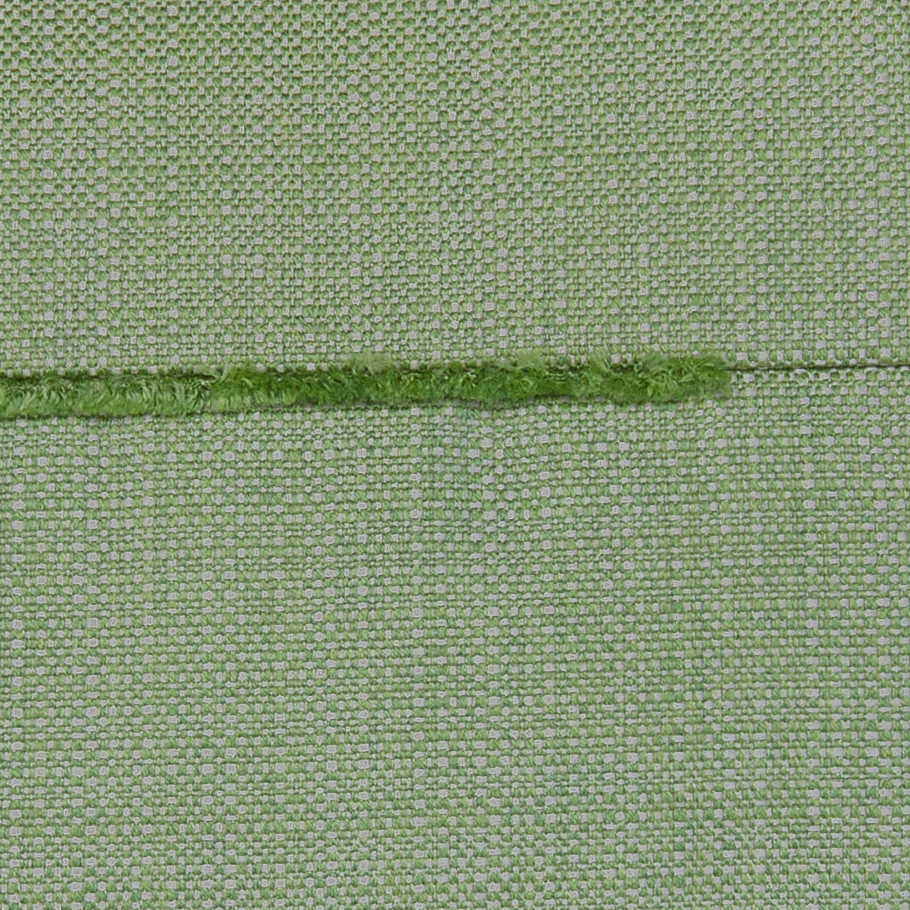 Detail image of Green solid with micro fringe detailing outdoor pillow in square size for natural indoor and outdoor decor
