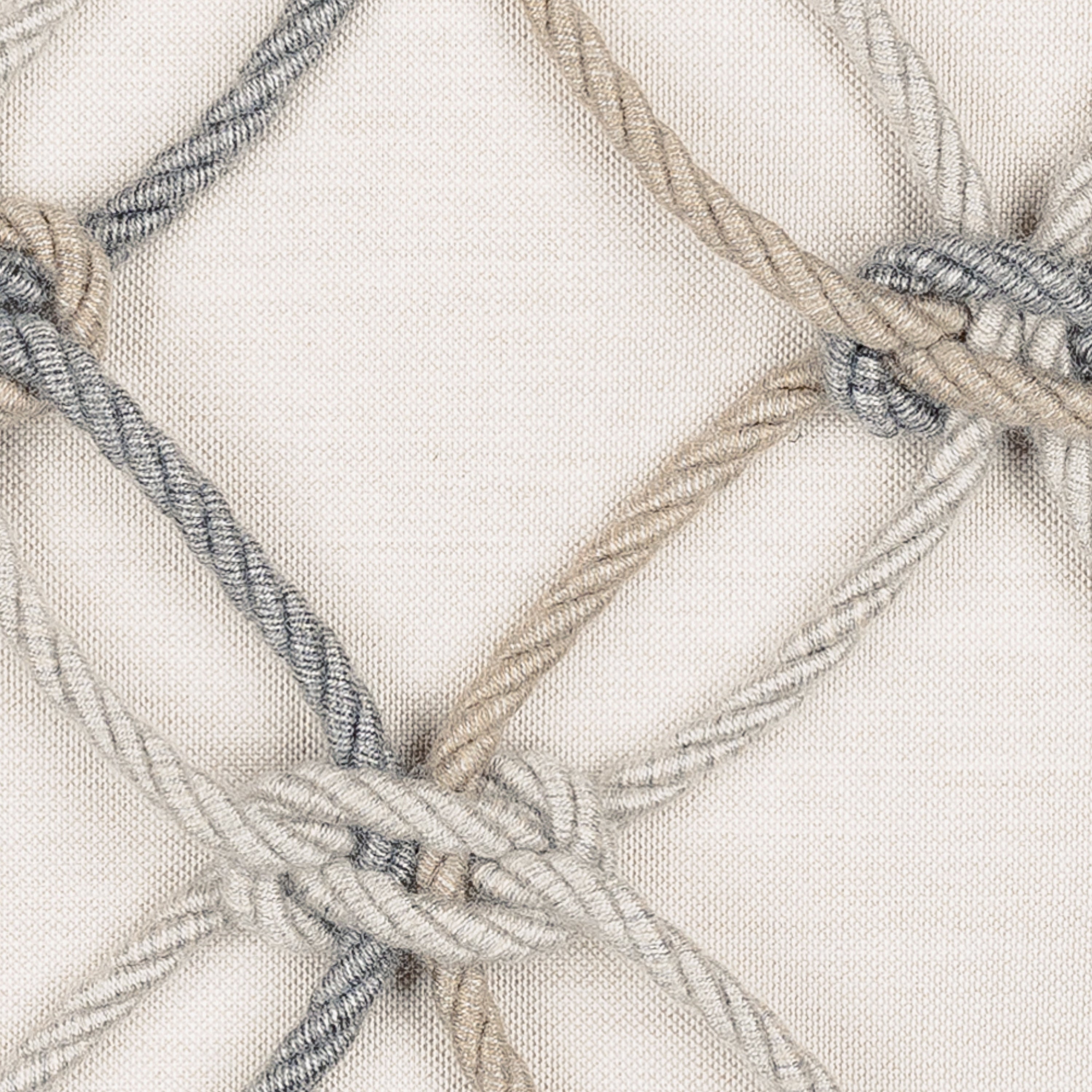 Detail image of Beige outdoor pillow with macrame rope pattern square size for elegant patio decor