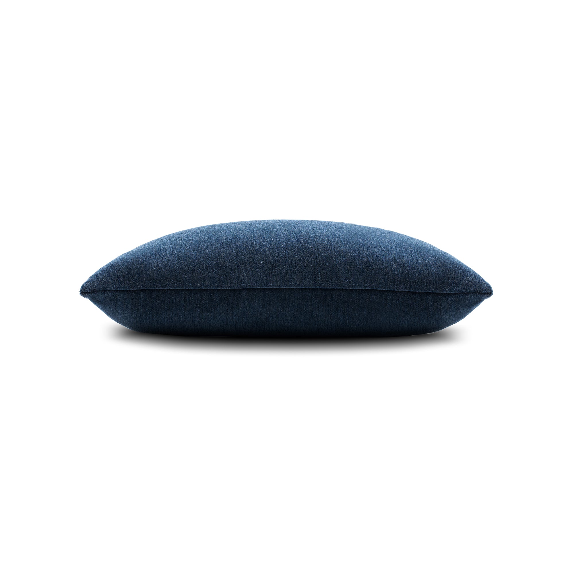 Side image of Indigo velour outdoor pillow lumbar size for sophisticated indoor and outdoor decor by Elaine Smith
