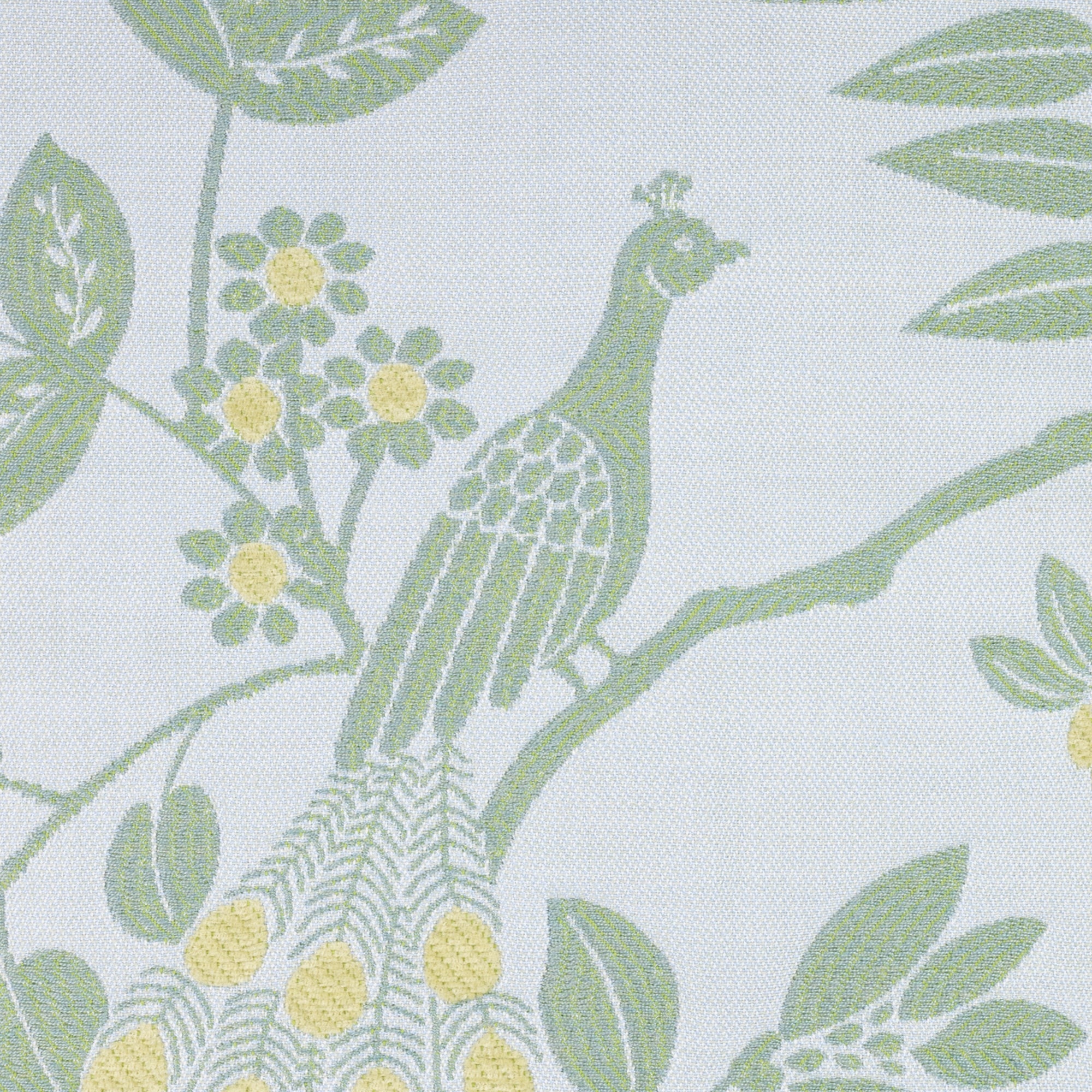 Detail image of Green leaf motif pillow with corner tassels for elegant indoor and outdoor decor