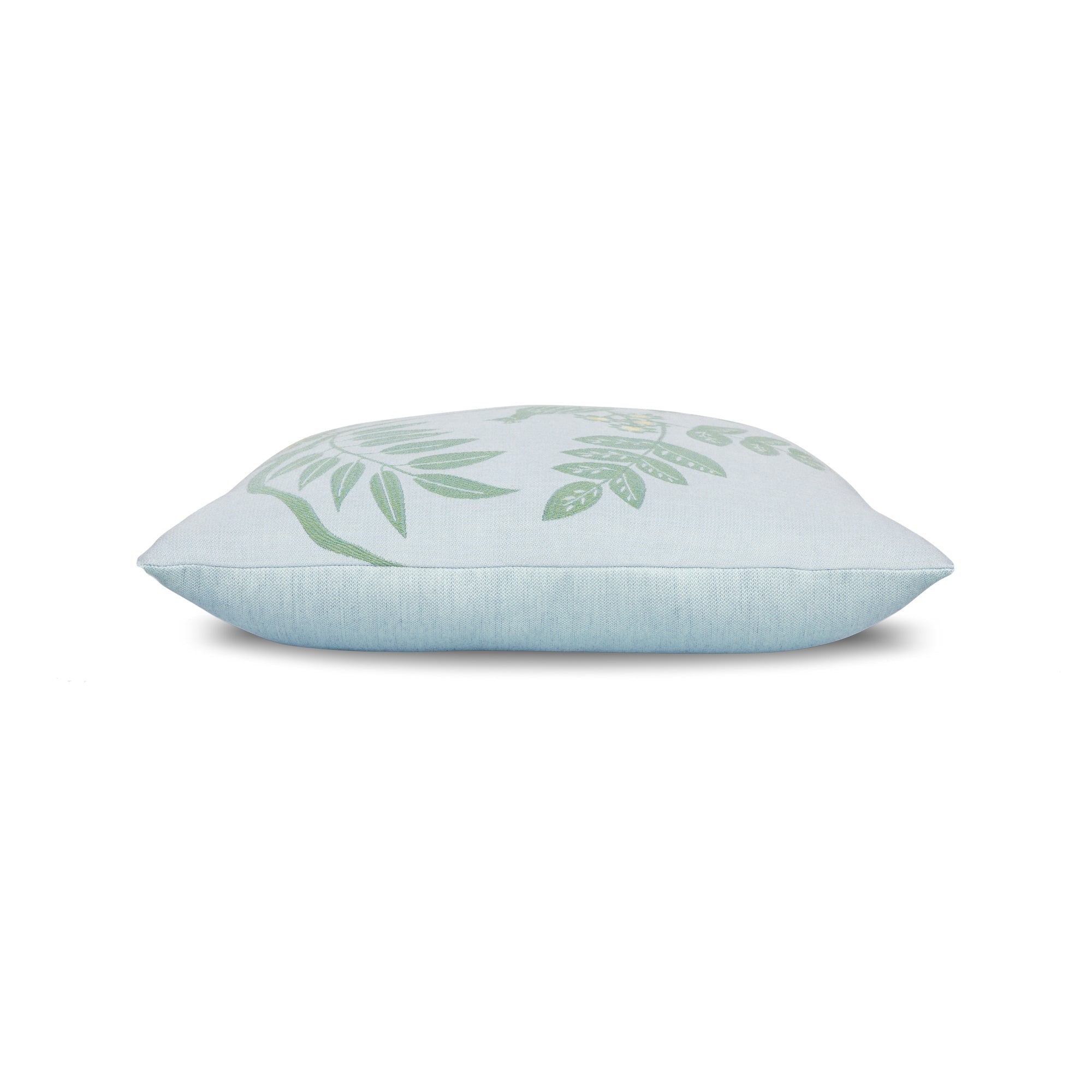 Side image of Green leaf motif pillow with corner tassels for elegant indoor and outdoor decor