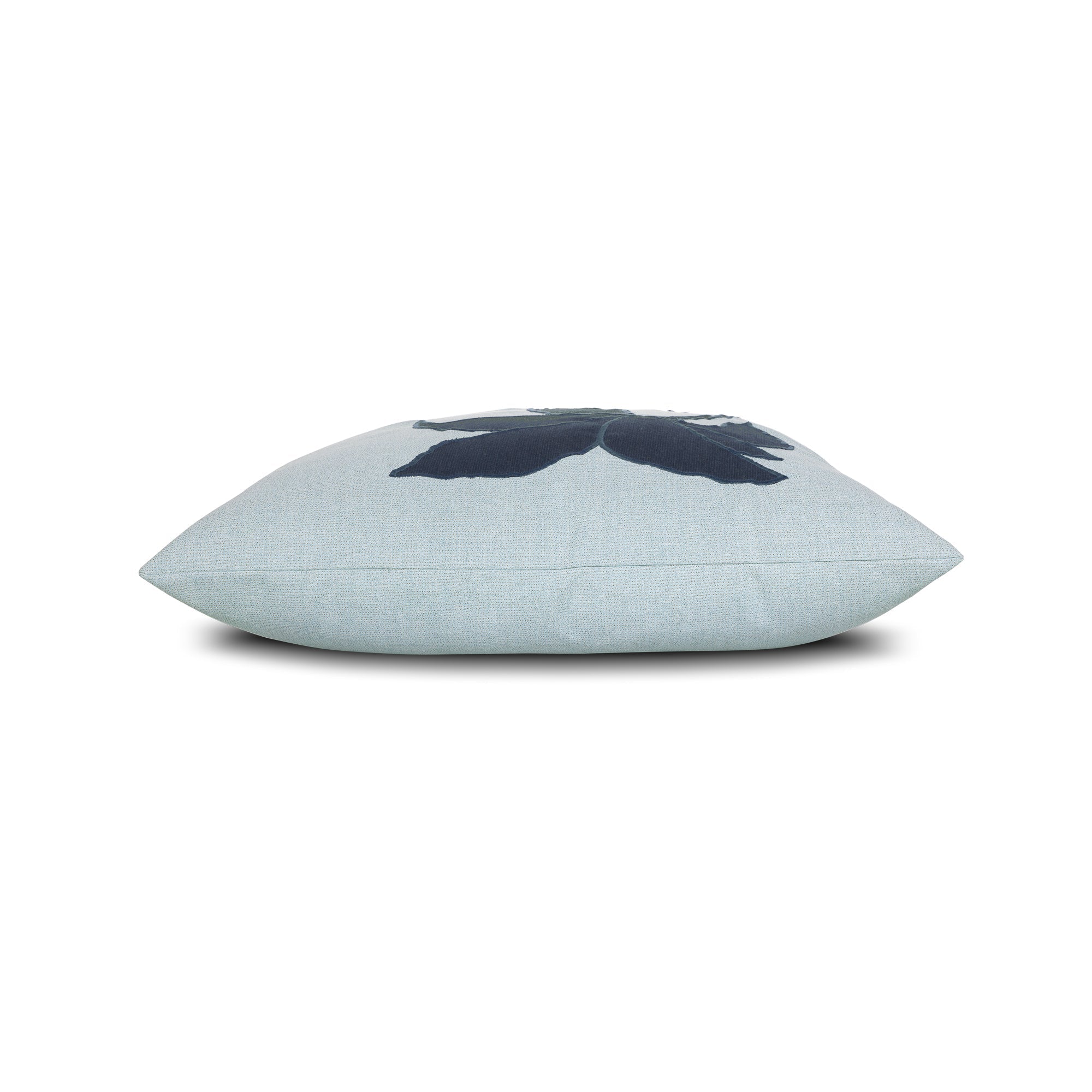 Side image of Navy outdoor pillow with oversized floral print for luxury outdoor seating by Elaine Smith