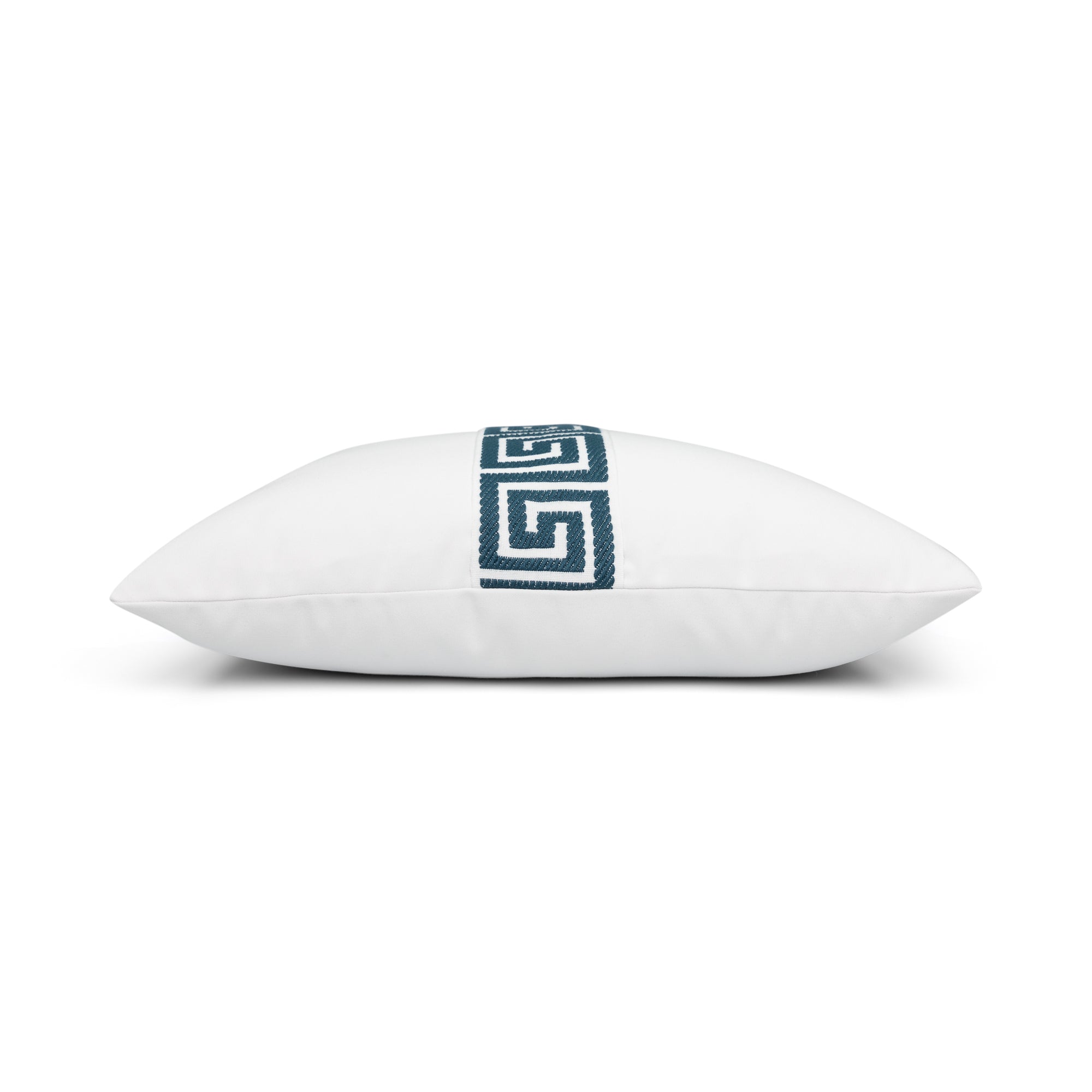 Side image of White pillow with teal greek key band in lumbar size for indoor and outdoor décor