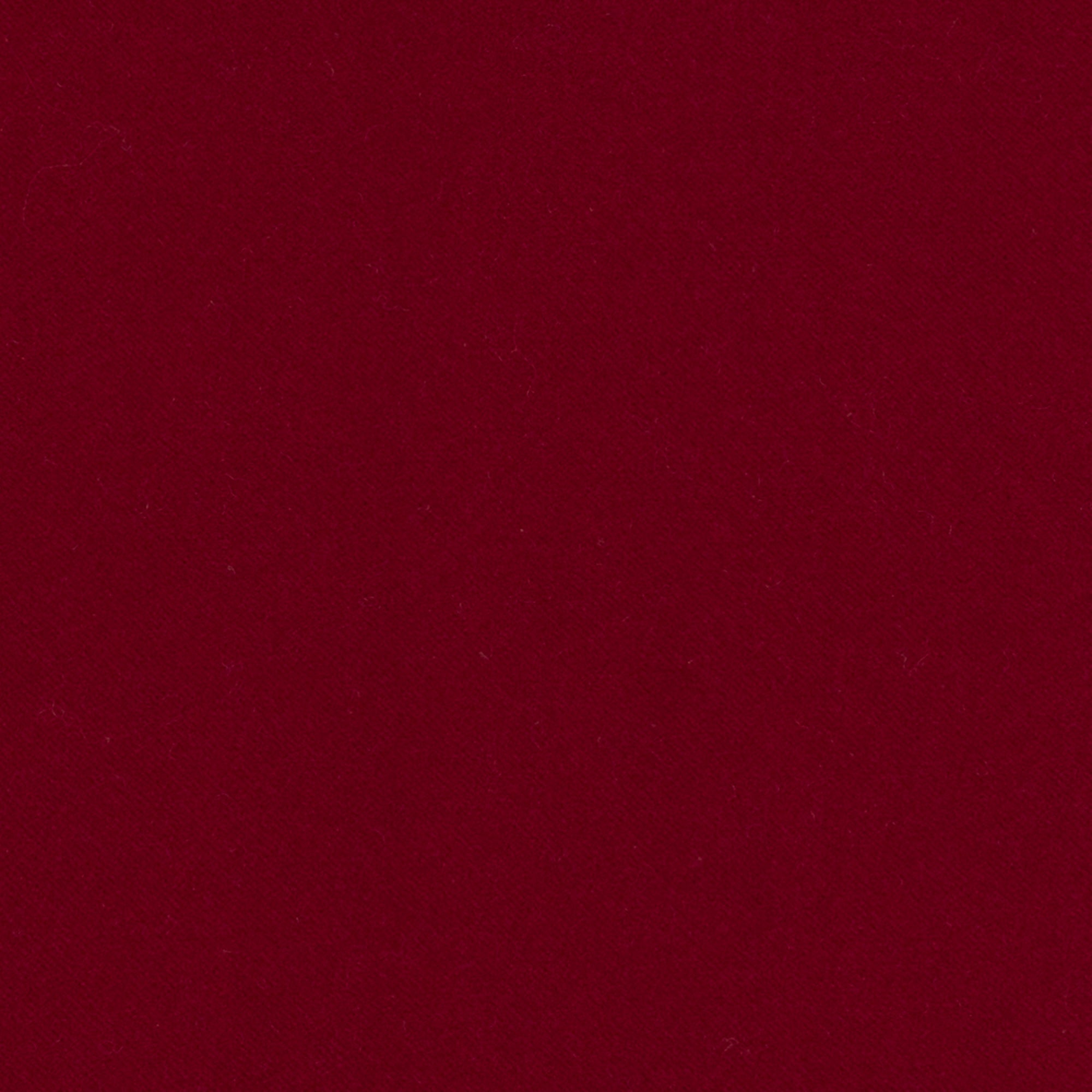 Detail image of Red velvet pillow with textured finish in square size for stylish patio decor