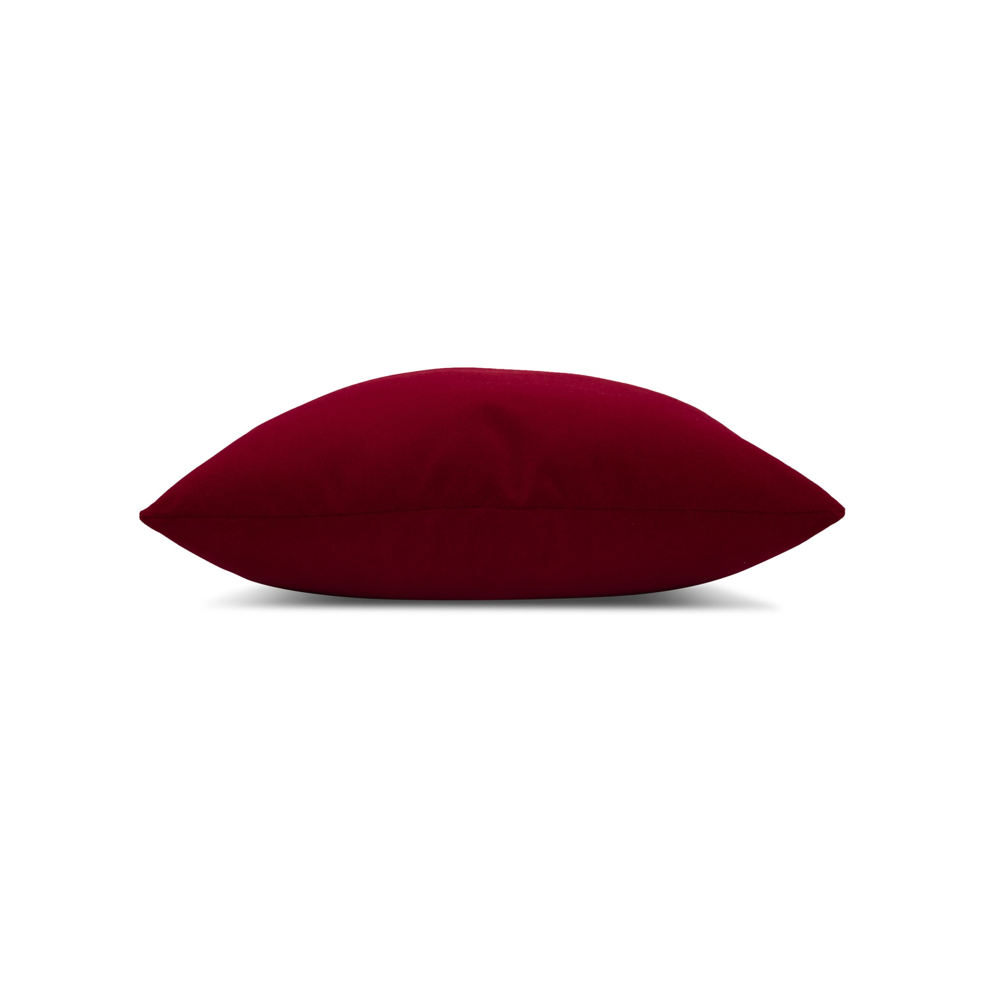 Side image of Red velvet pillow with textured finish in square size for stylish patio decor
