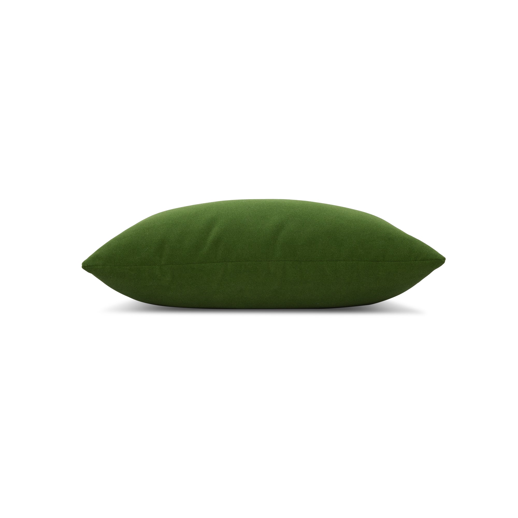 Side image of Green solid velvet pillow lumbar size for earthy patio decor