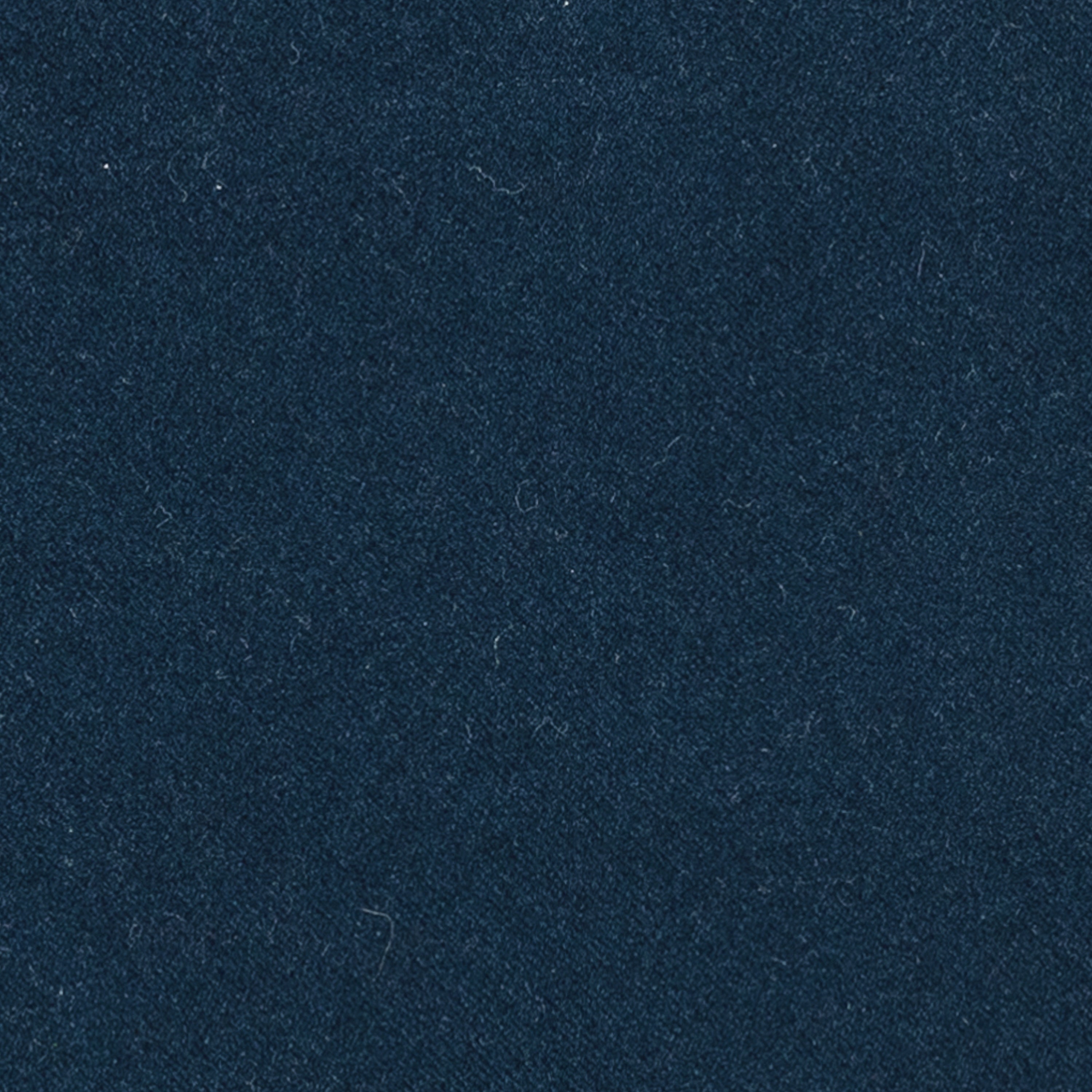 Detail image of Navy solid velvet pillow lumbar size for sophisticated patio decor