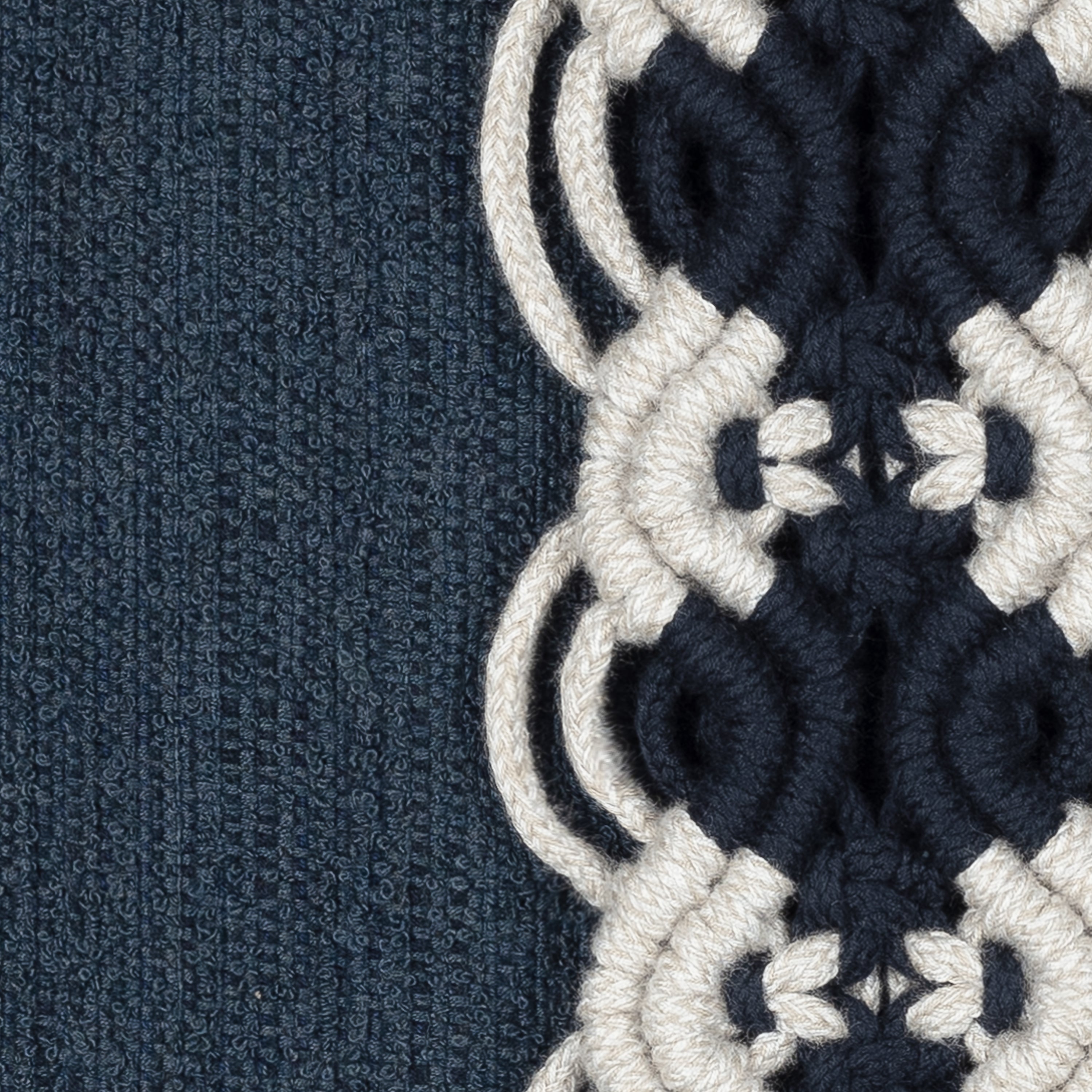 Detail image of Indigo outdoor pillow with macrame banding design, square size for timeless outdoor styling