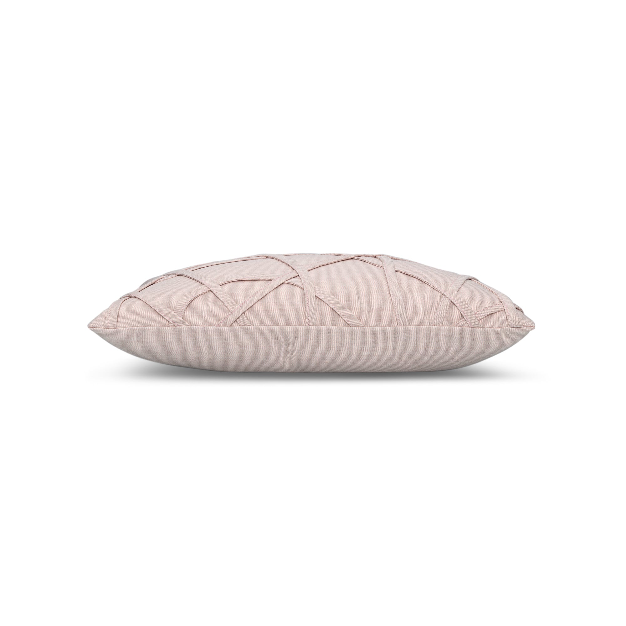 Side image of Soft pink outdoor pillow with solid texture lumbar size for earthy patio décor