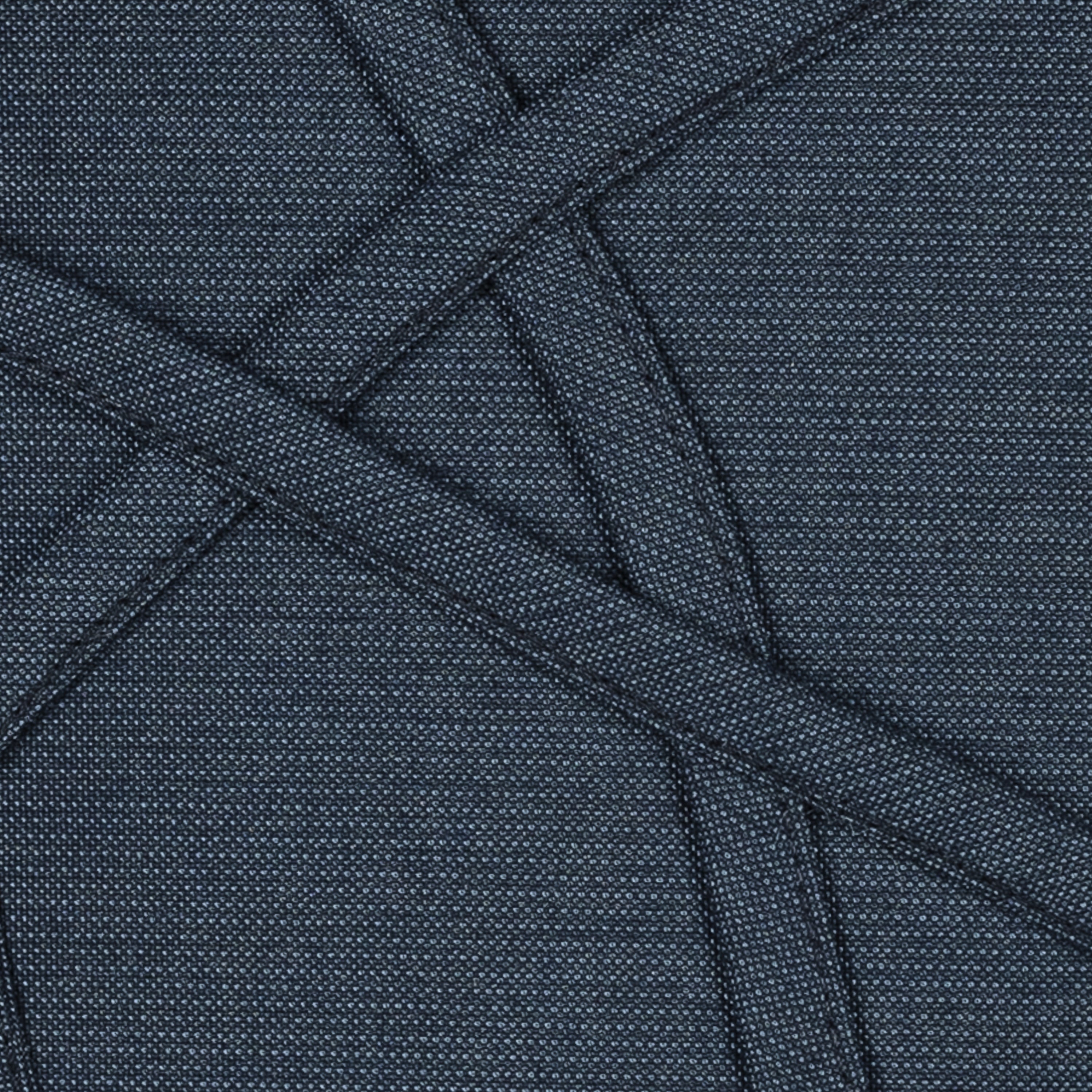 Detail image of Indigo outdoor pillow with solid texture lumbar size for elegant patio decor by Elaine Smith