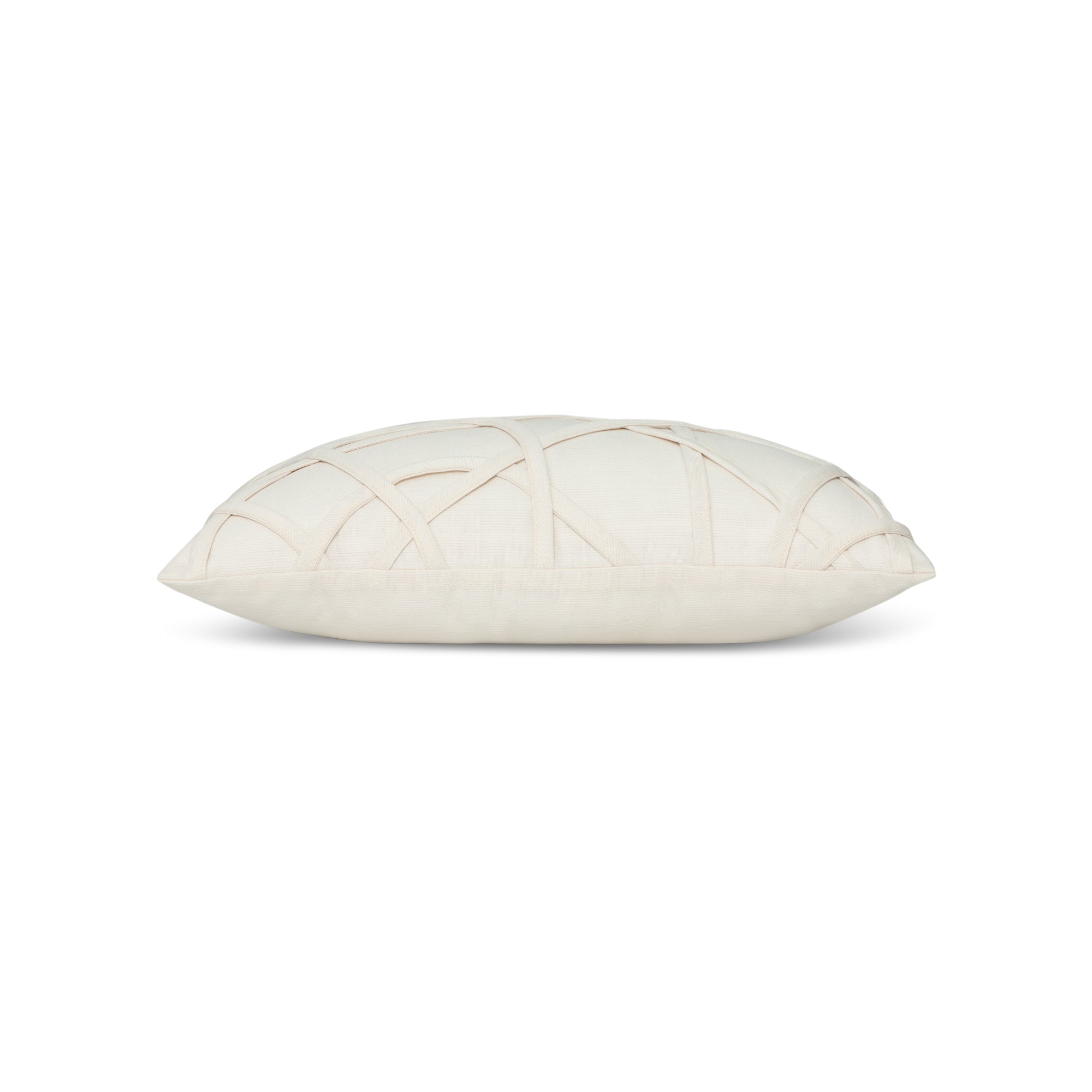 Side image of Ivory outdoor pillow with solid texture lumbar size for sophisticated patio decor