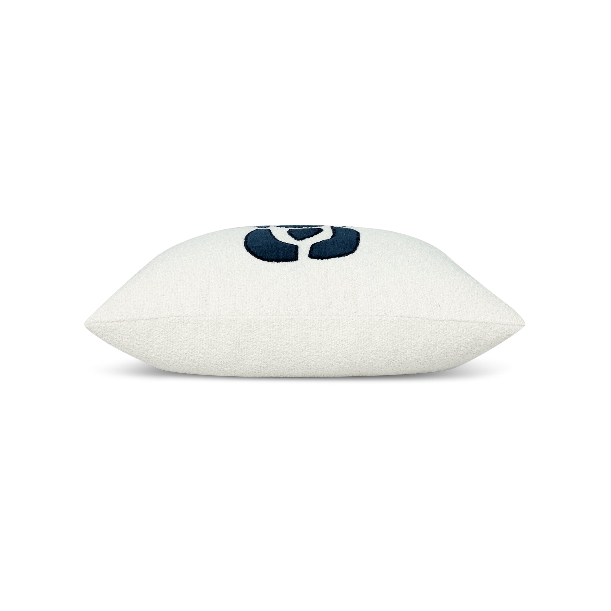 Side image of Ivory textured pillow with indigo velour details in square size for chic indoor and outdoor decor