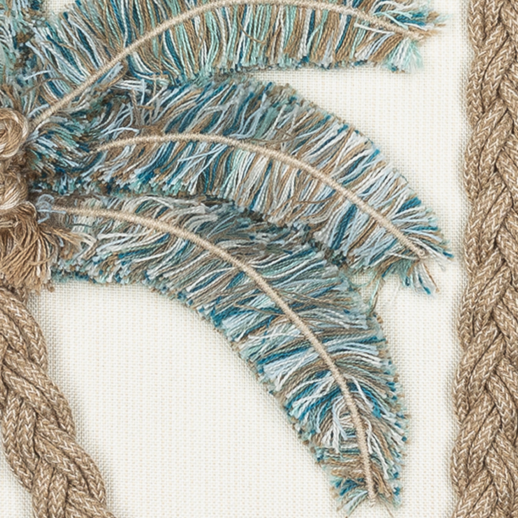 Detail image of Ivory outdoor pillow with palm leaf pattern square size for tropical patio decor