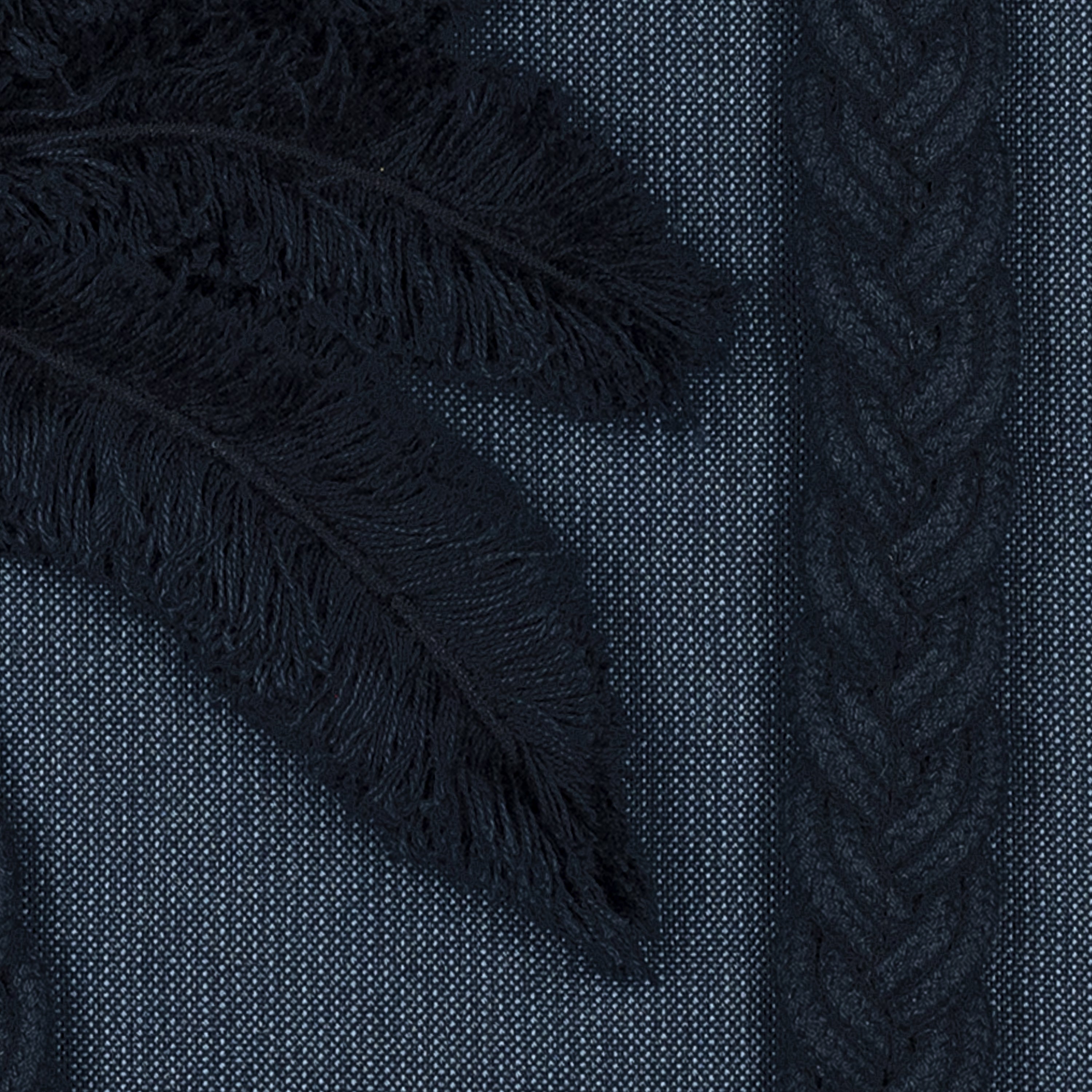 Detail image of Black outdoor pillow with palm leaf pattern square size for bold patio decor