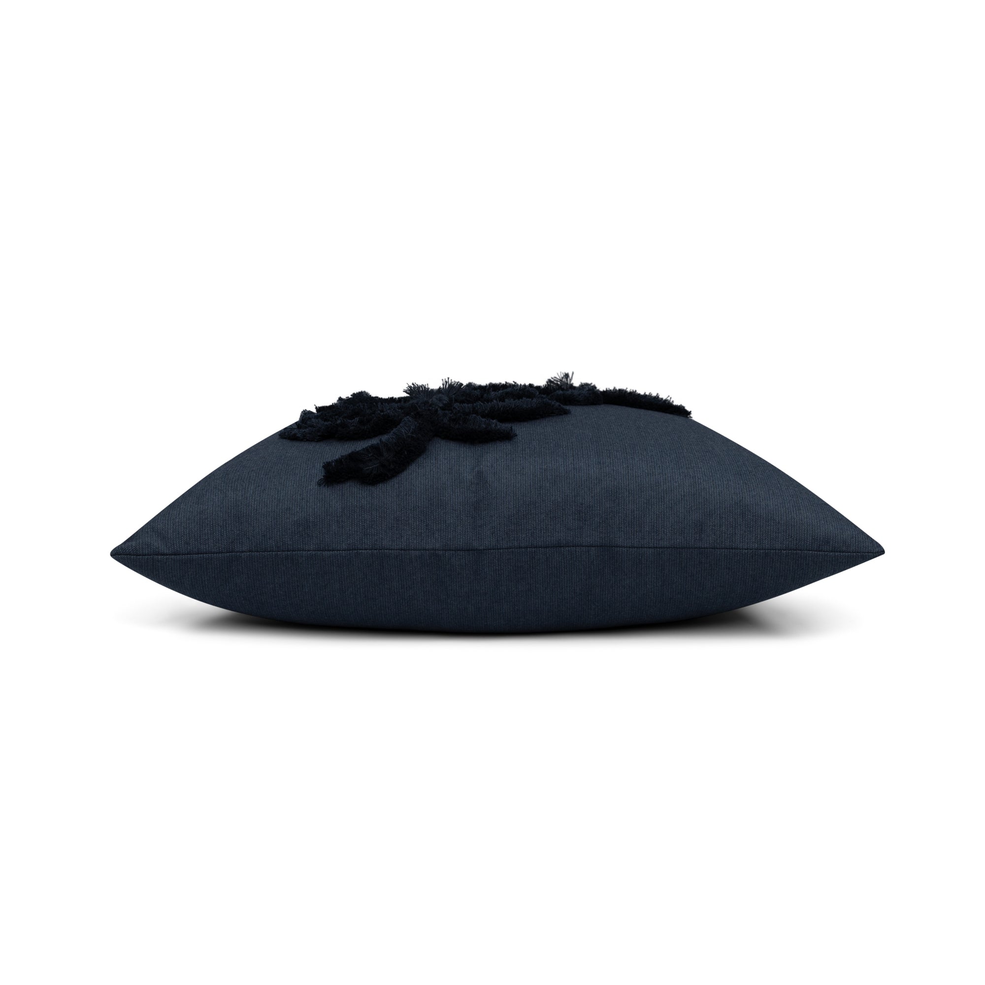 Side image of Black outdoor pillow with palm leaf pattern square size for bold patio decor
