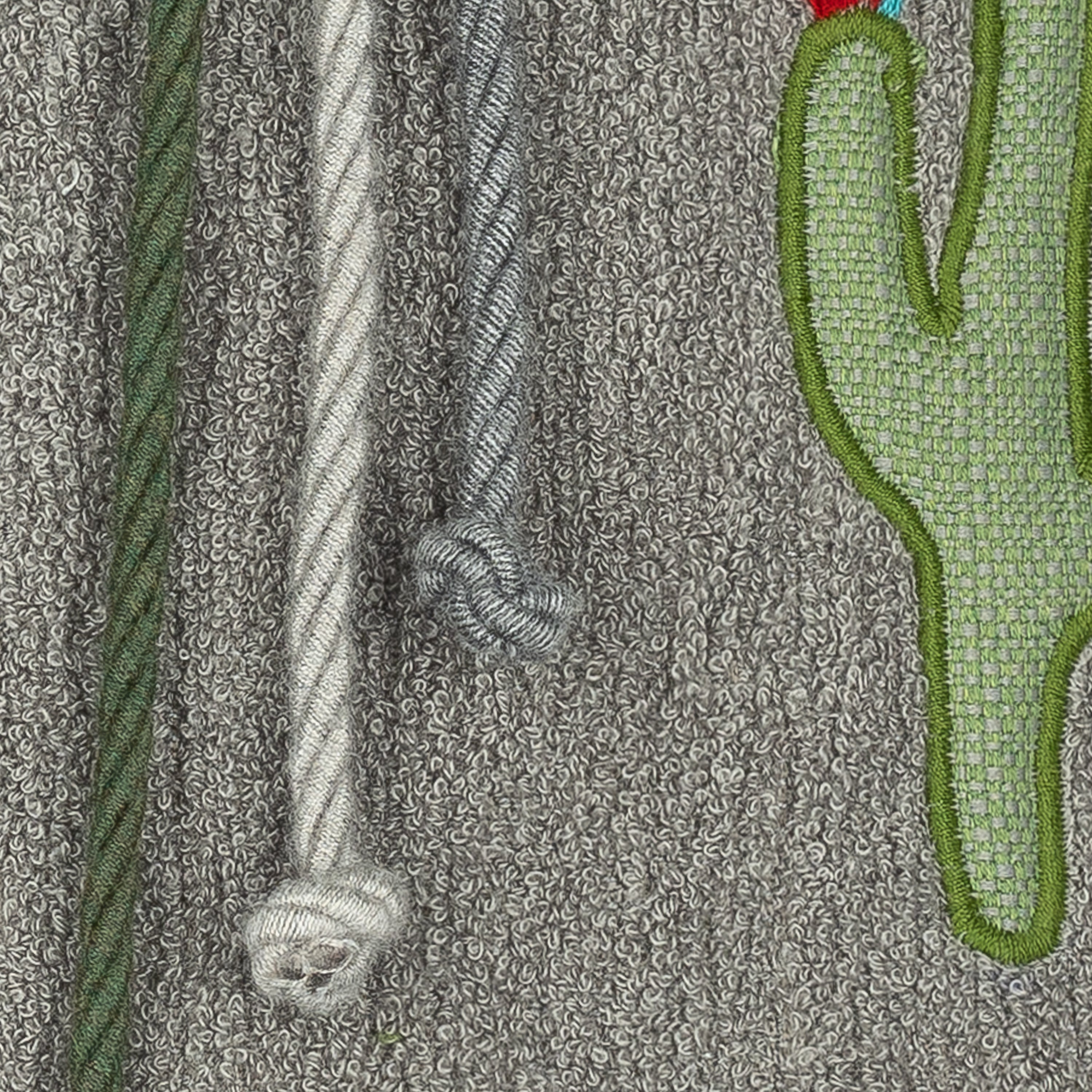 Detail image of Gray outdoor pillow with solid texture, square size for neutral outdoor accents by Elaine Smith