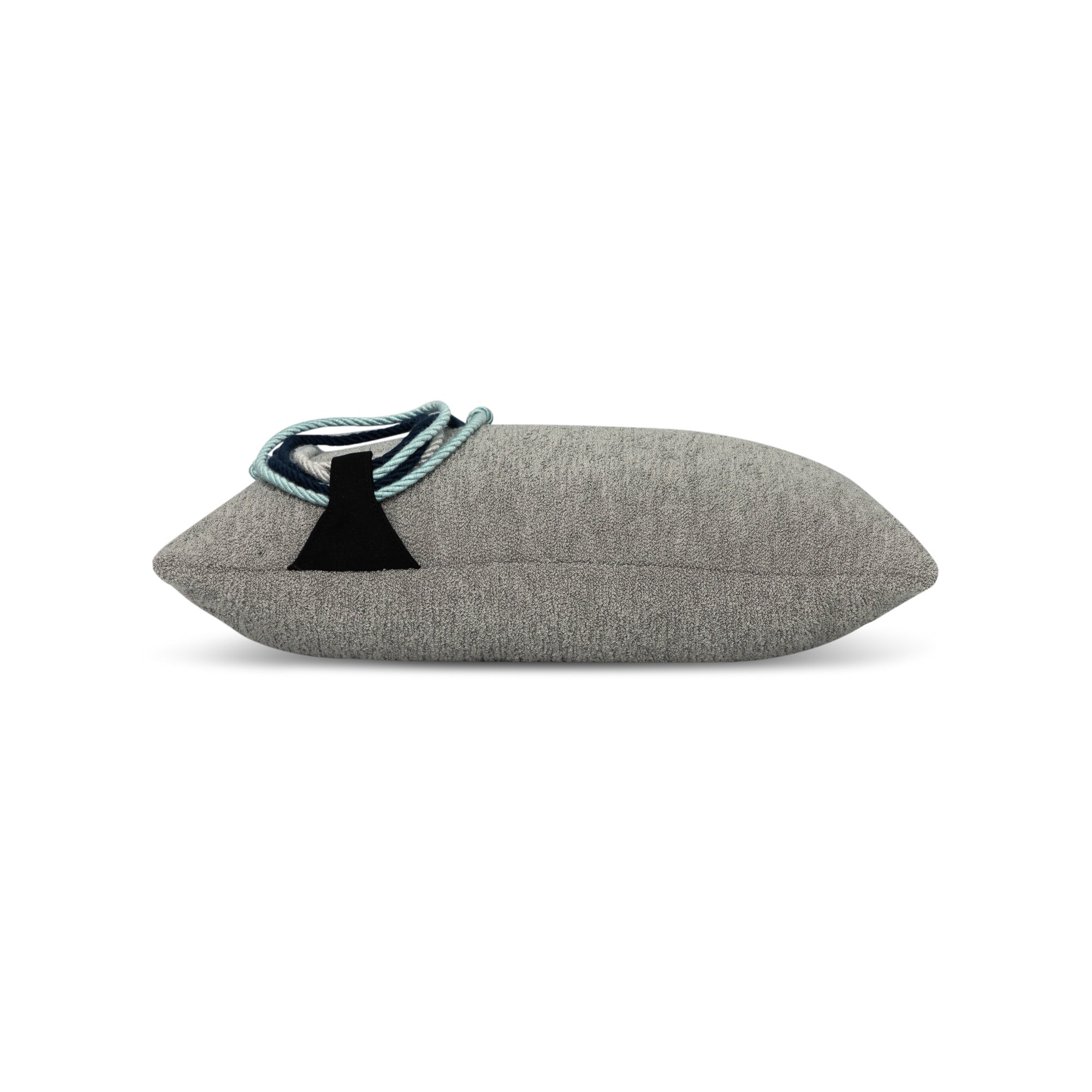 Side image of Gray textured outdoor pillow with rope detailing in lumbar size for modern patio decor