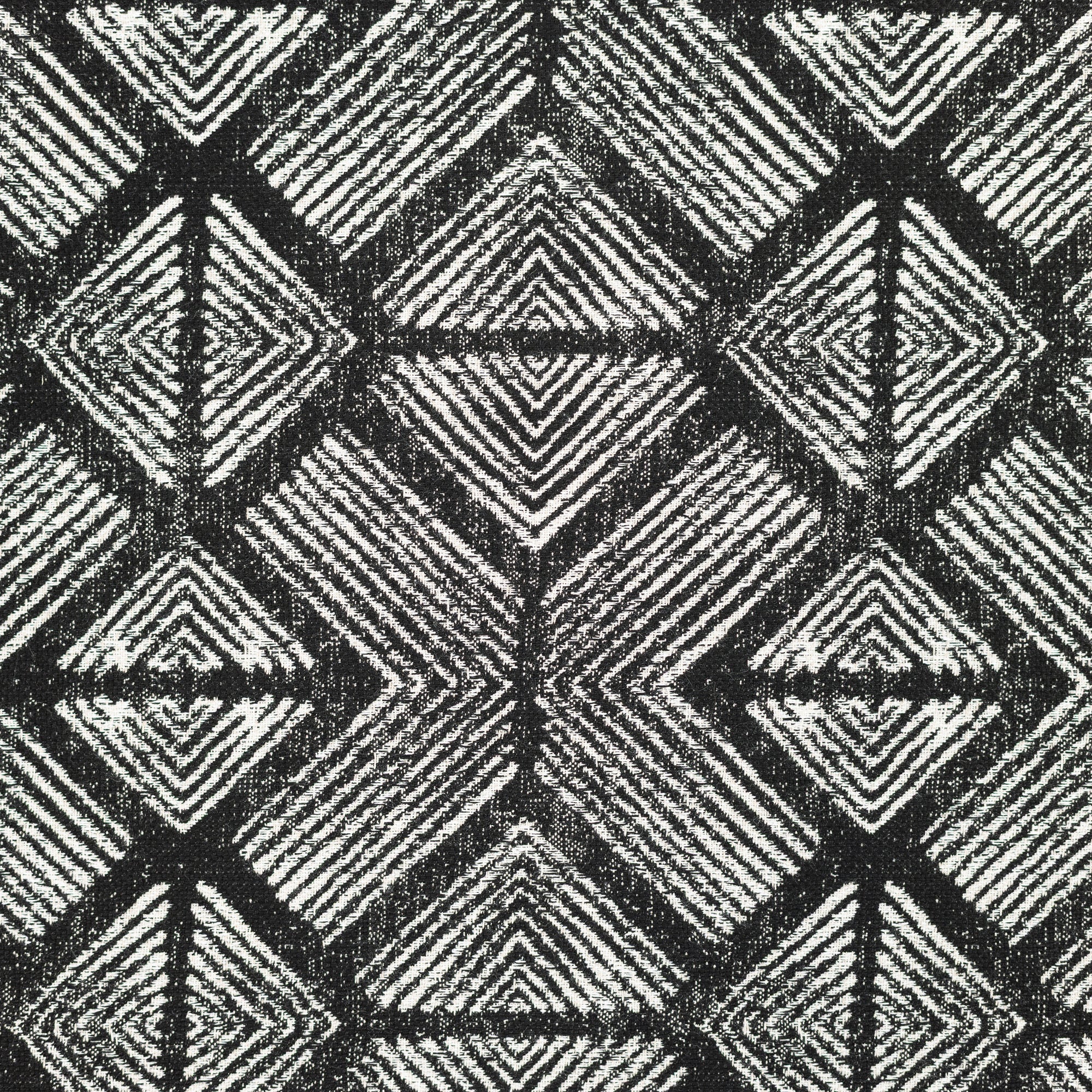 Detail image of Tribal-inspired geometric outdoor safe fabric in ebony tones