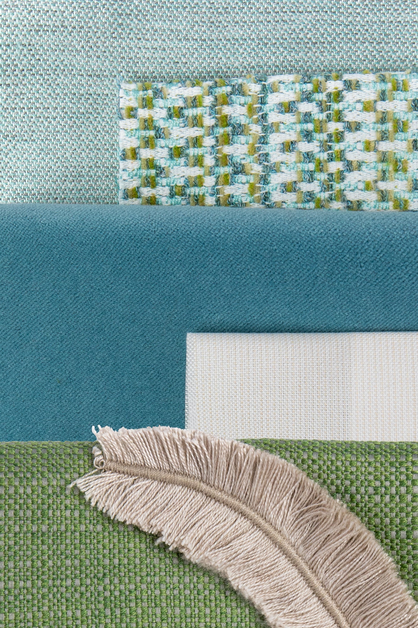 Coordinating fabrics to Soft glacier blue outdoor safe woven fabric with solid color