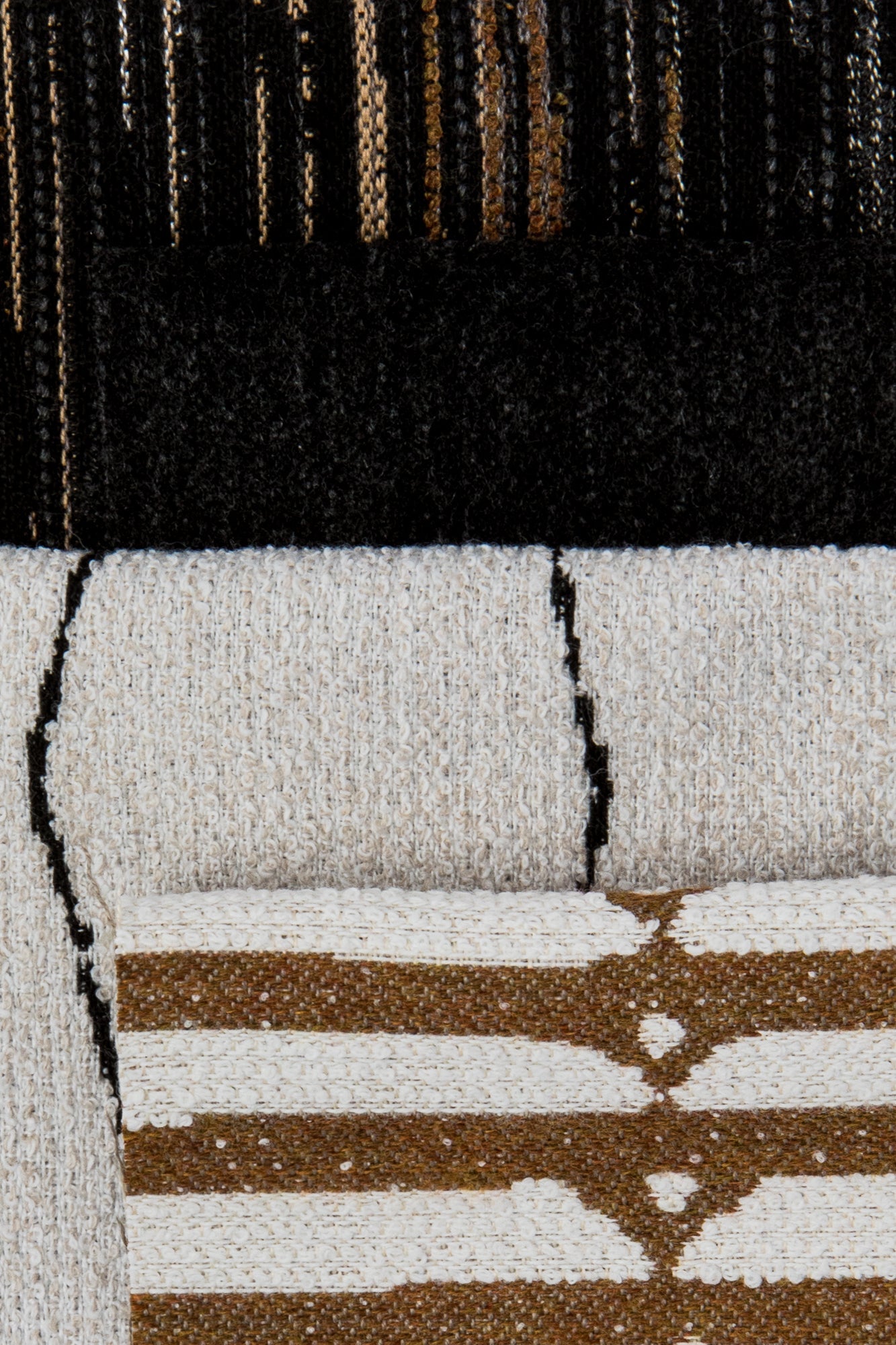 Coordinating fabrics to Minimalist black linear geometric pattern woven into textured boucle outdoor safe fabric