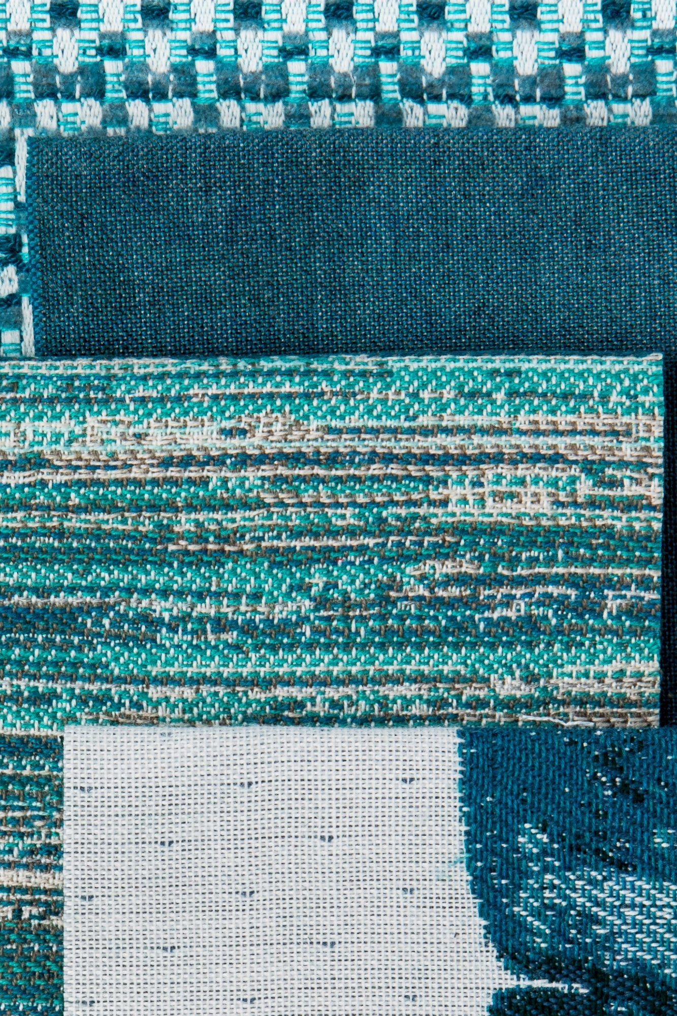 Coordinating fabrics to Lagoon blue multi-colored chenille kaleidoscope pattern outdoor safe woven fabric