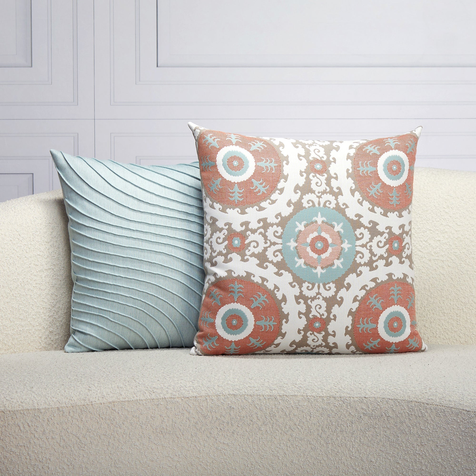 Indoor environmental image of pillows in Suzani Oasis – outdoor-safe woven fabric by Elaine Smith, ideal for high-end commercial and residential applications.