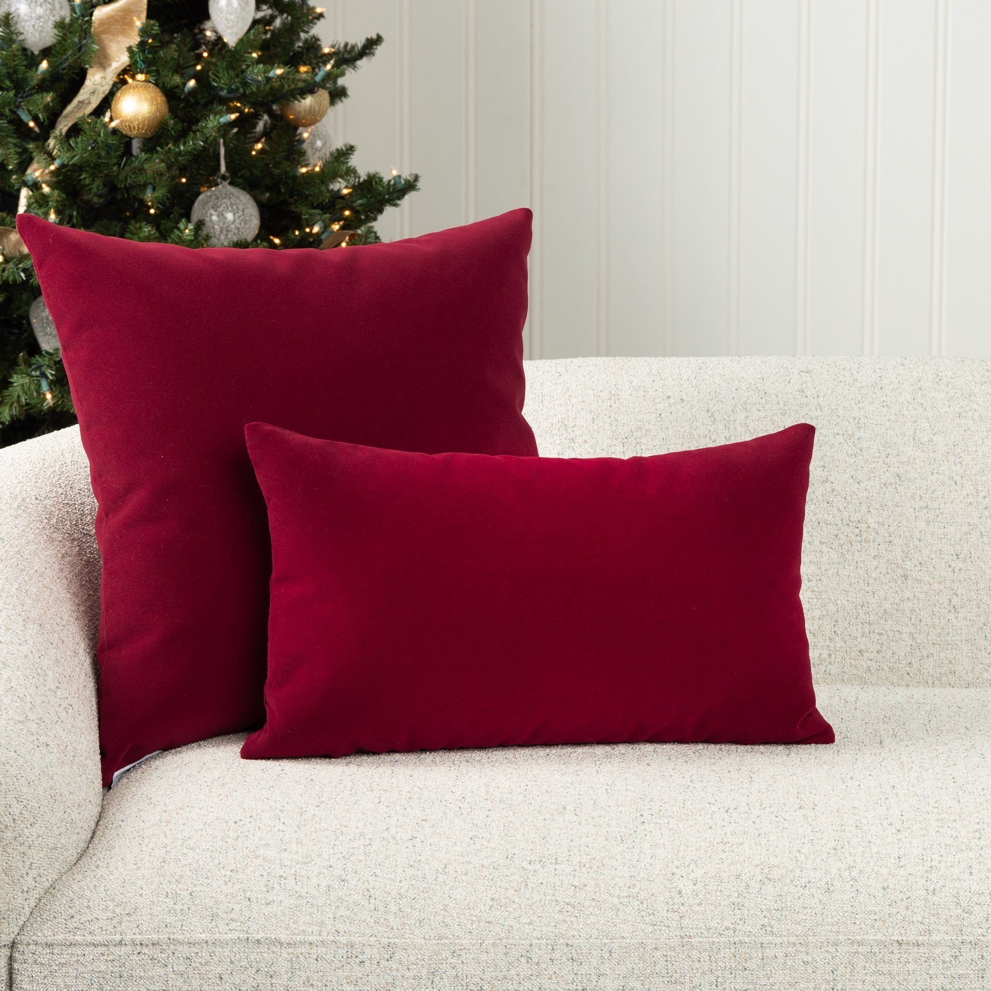 Indoor environmental image of square velvet pillows in various colors by elaine smith