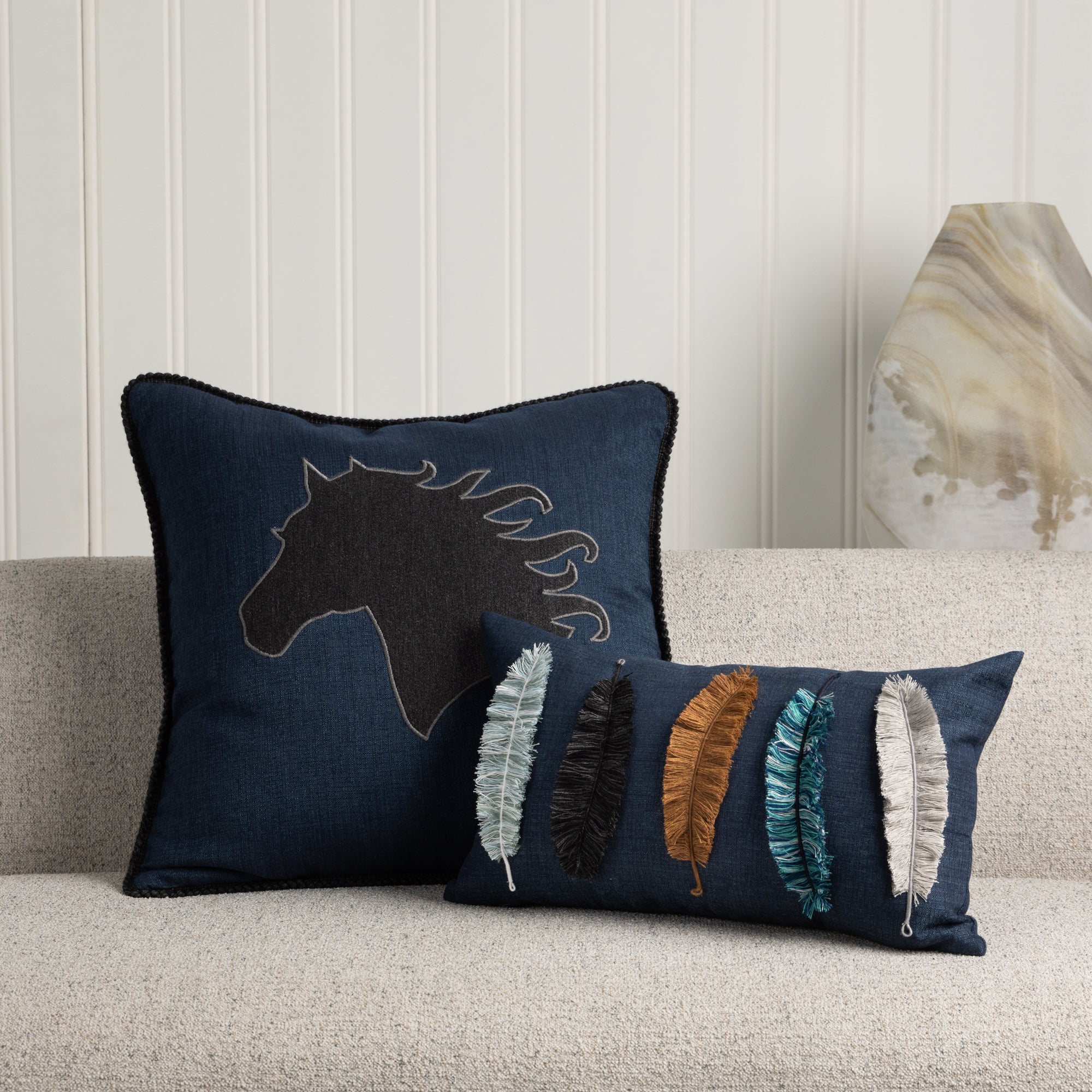 Indoor environmental image of pillows in Deep indigo outdoor-safe woven fabric with luxurious texture – Solid Indigo by Elaine Smith