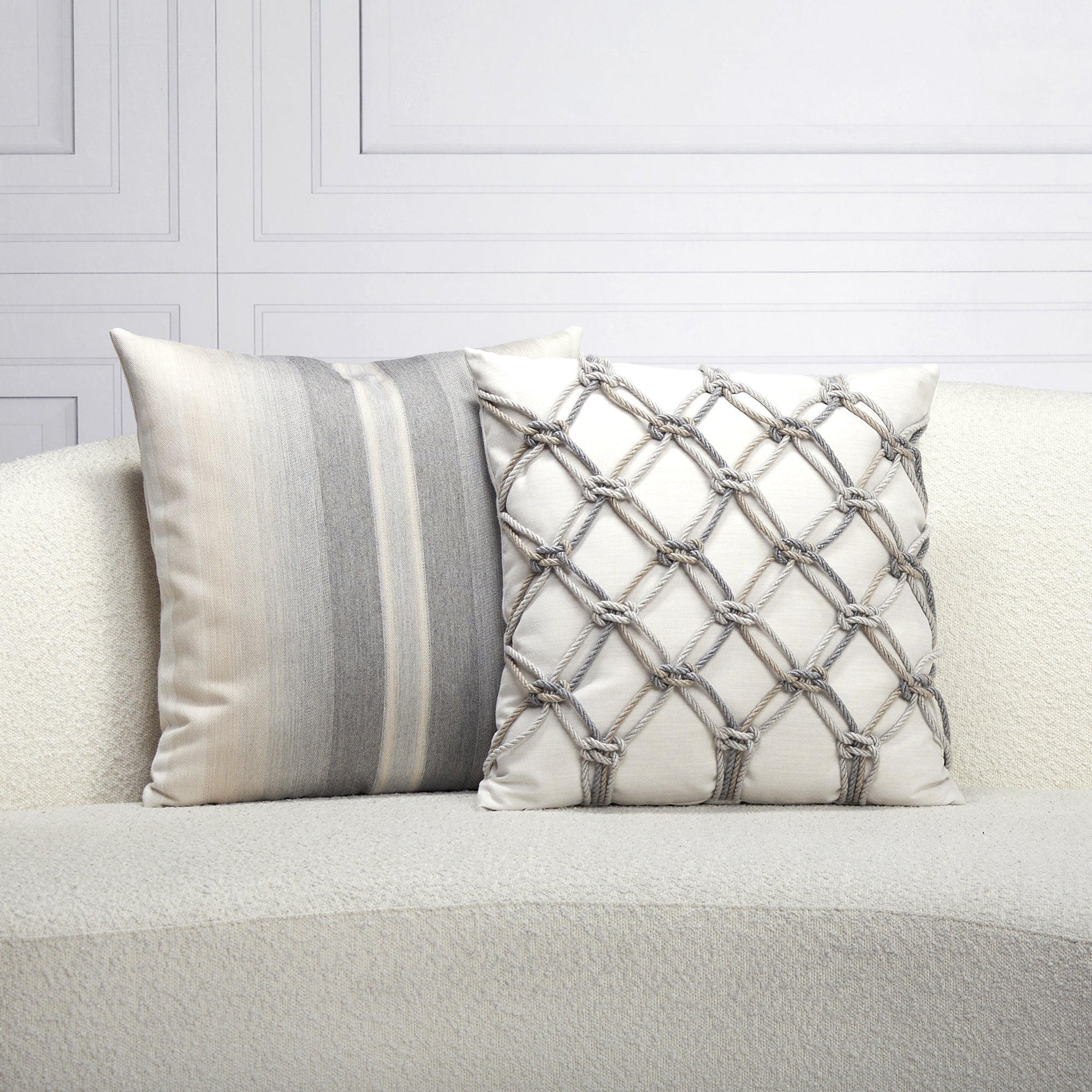 Indoor environmental image of pillows in Gray gradient ombre outdoor safe woven fabric – Ombre Grigio by Elaine Smith