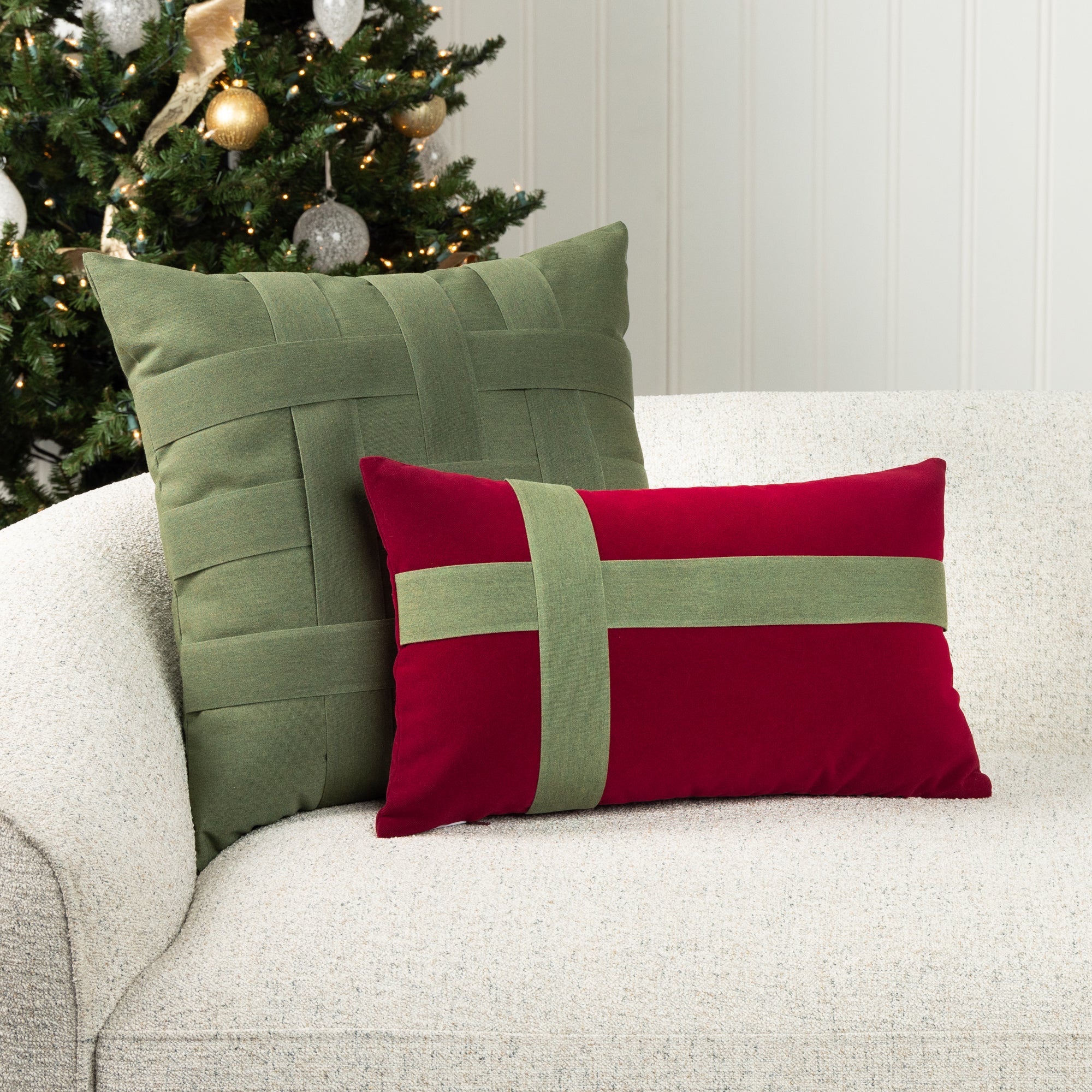 Luxury holiday image of lumbar pillow in ruby velvet with square basketweave pillow in green