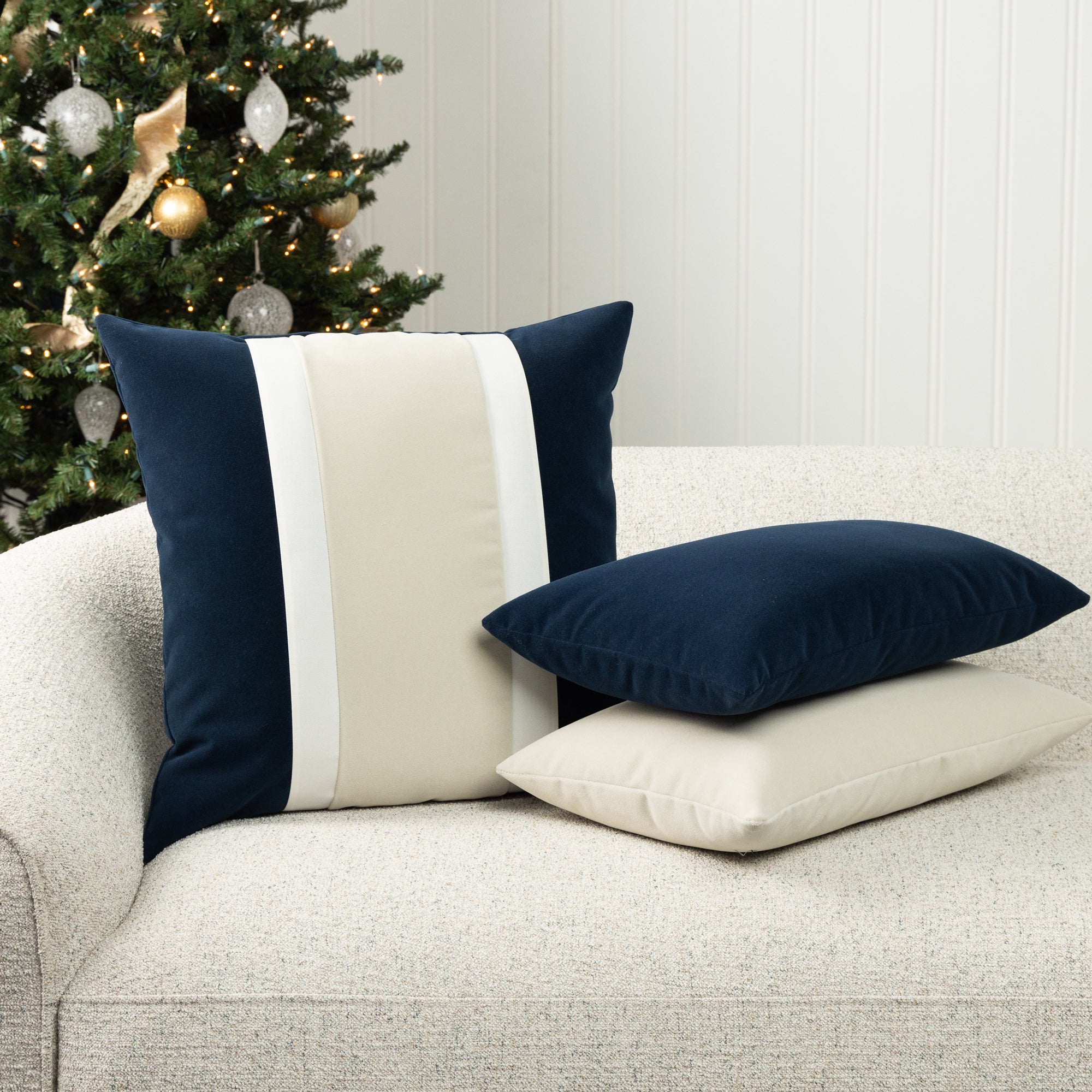 Indoor environmental image of pillows in Deep midnight blue velvet performance fabric for outdoor safe use - Lush Velvet Midnight by Elaine Smith