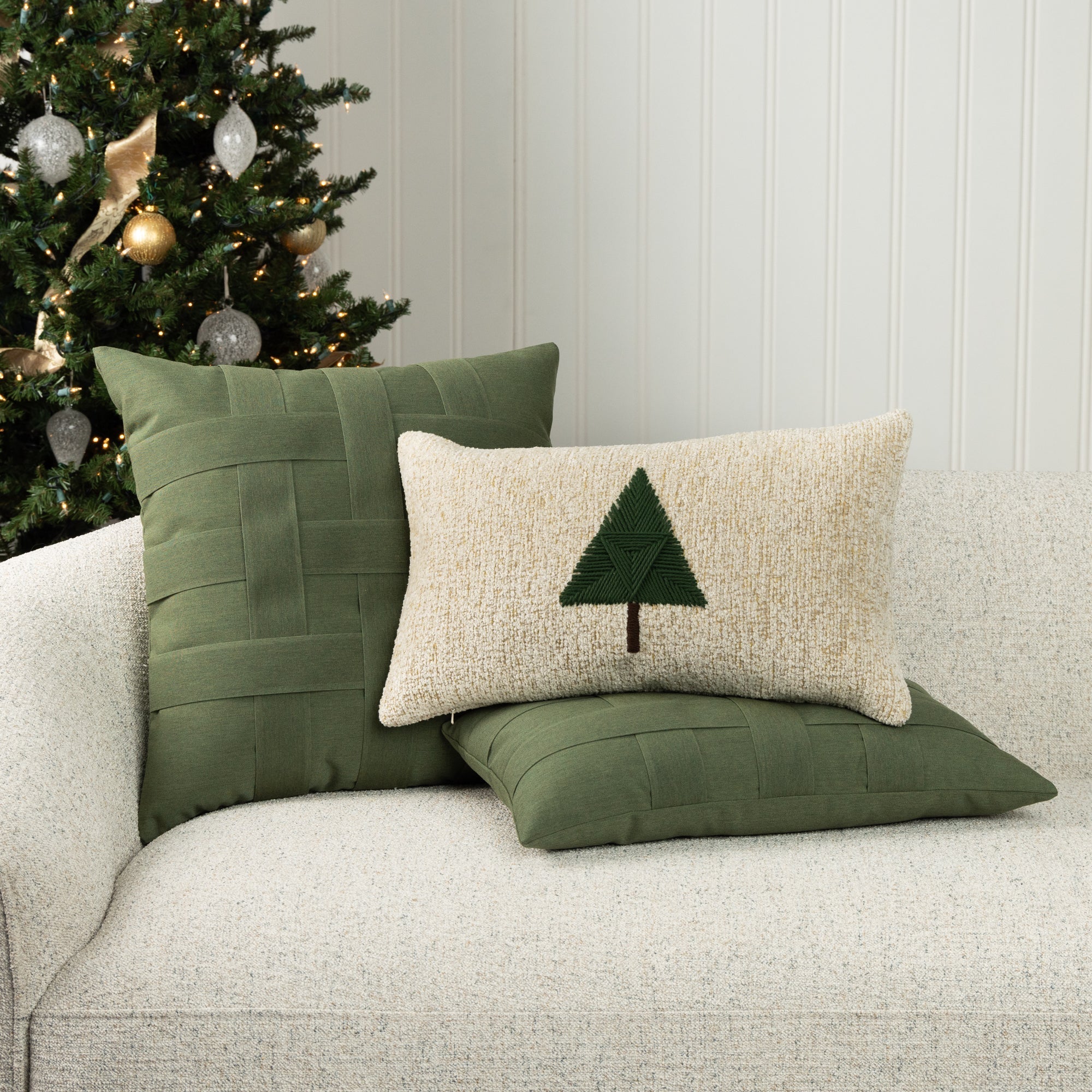 Indoor environmental image of pillows in Green fern tone outdoor-safe canvas style fabric