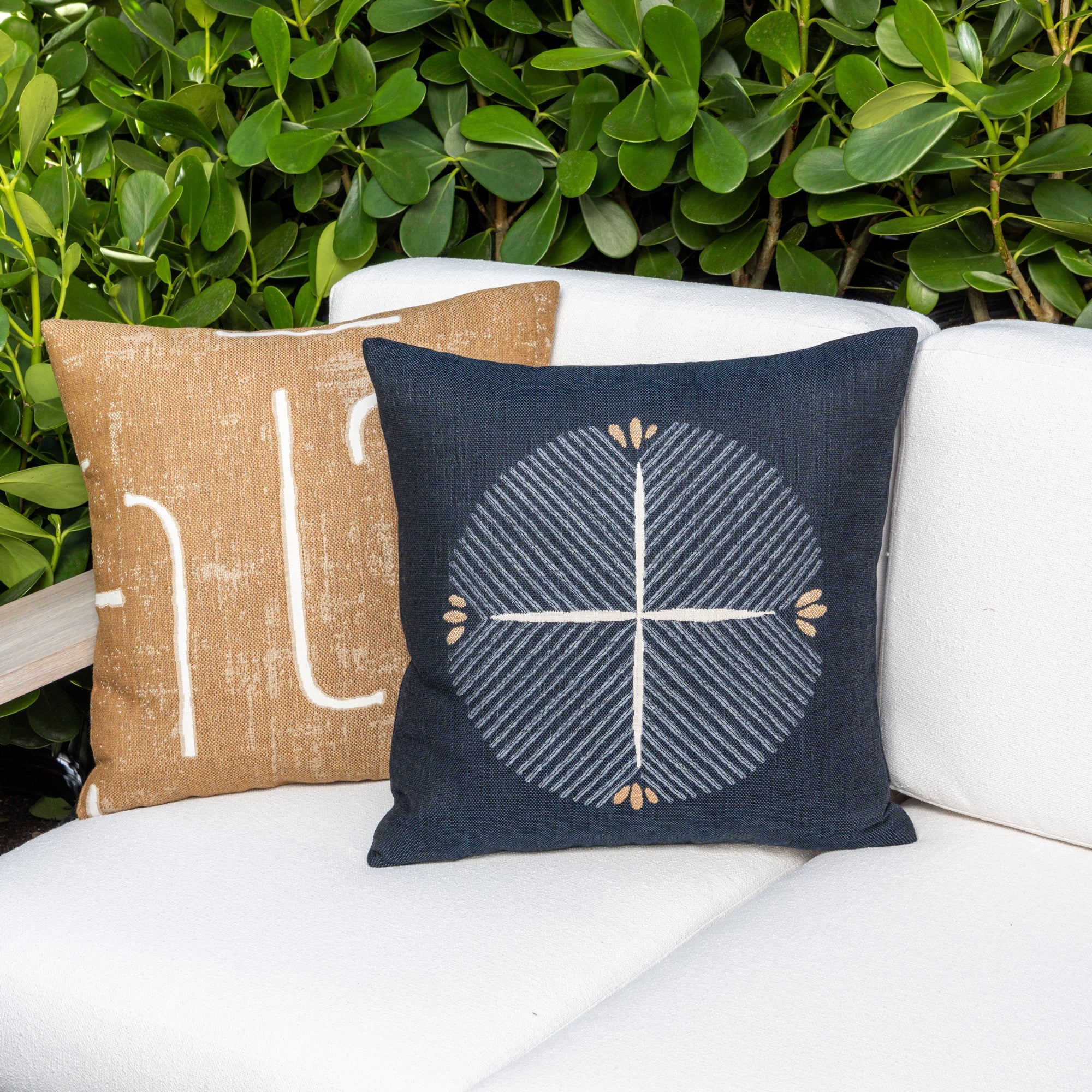 Luxury blue and white modern patterned accent pillow on a outdoor sofa, featuring tailored seams for a polished look to complete indoor and outdoor decor by Elaine Smith